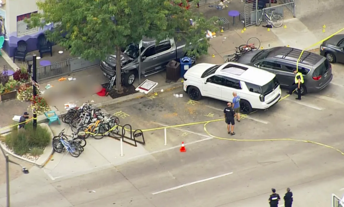 An 88-year-old Cheyenne was arrested Friday and charged with homicide for allegedly plowing into a crowded Fort Collins sidewalk in late August, killing a 33-year-old Denver man. Police ruled out impairment, but haven't said what caused the crash. Above is an aerial view of the scene reported by CBS Colorado.