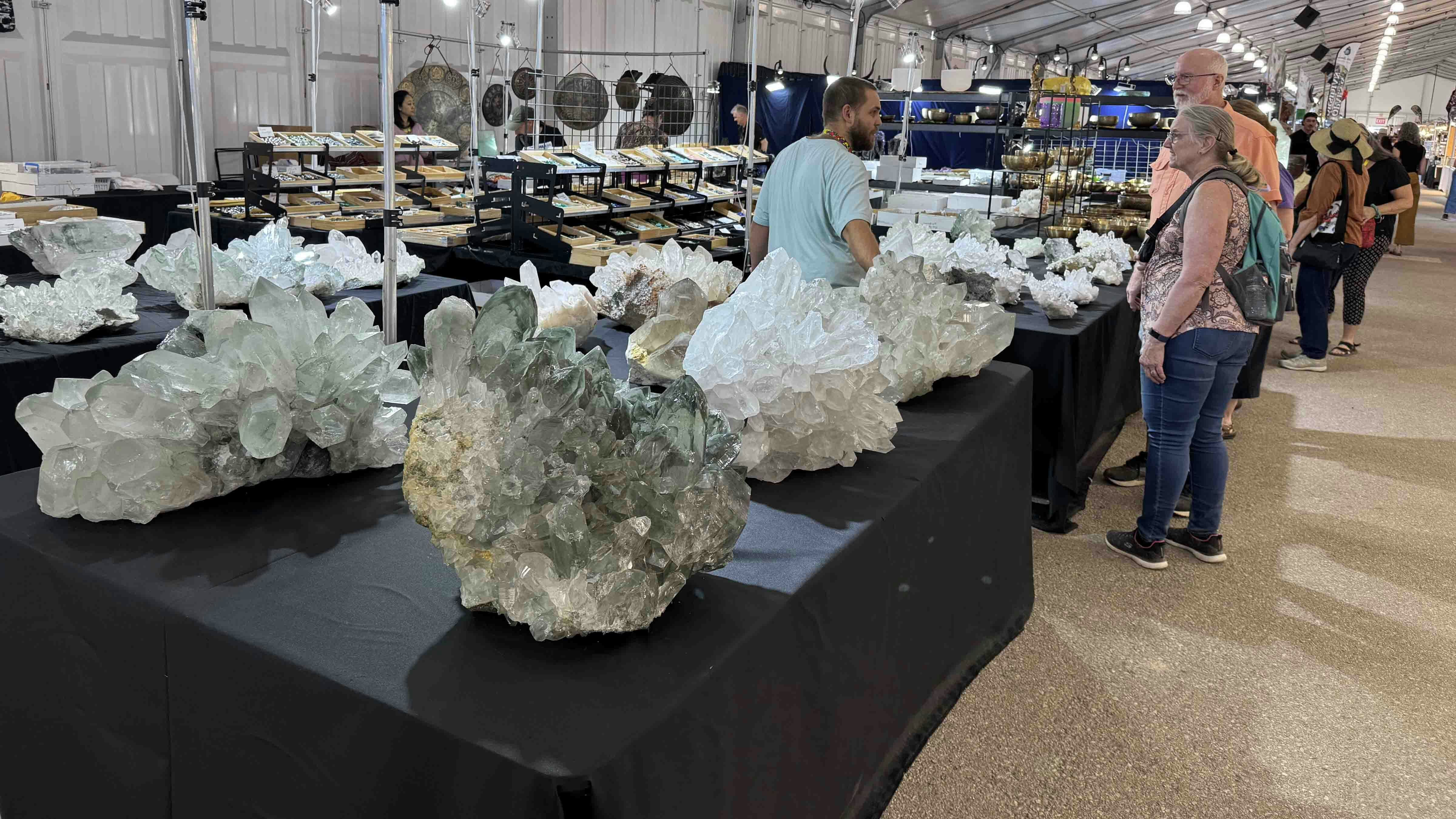 Large quartz crystals on display at the 22nd Street Mineral, Fossil, and Gem Show during the 2025 Tucson Gem and Mineral Show.