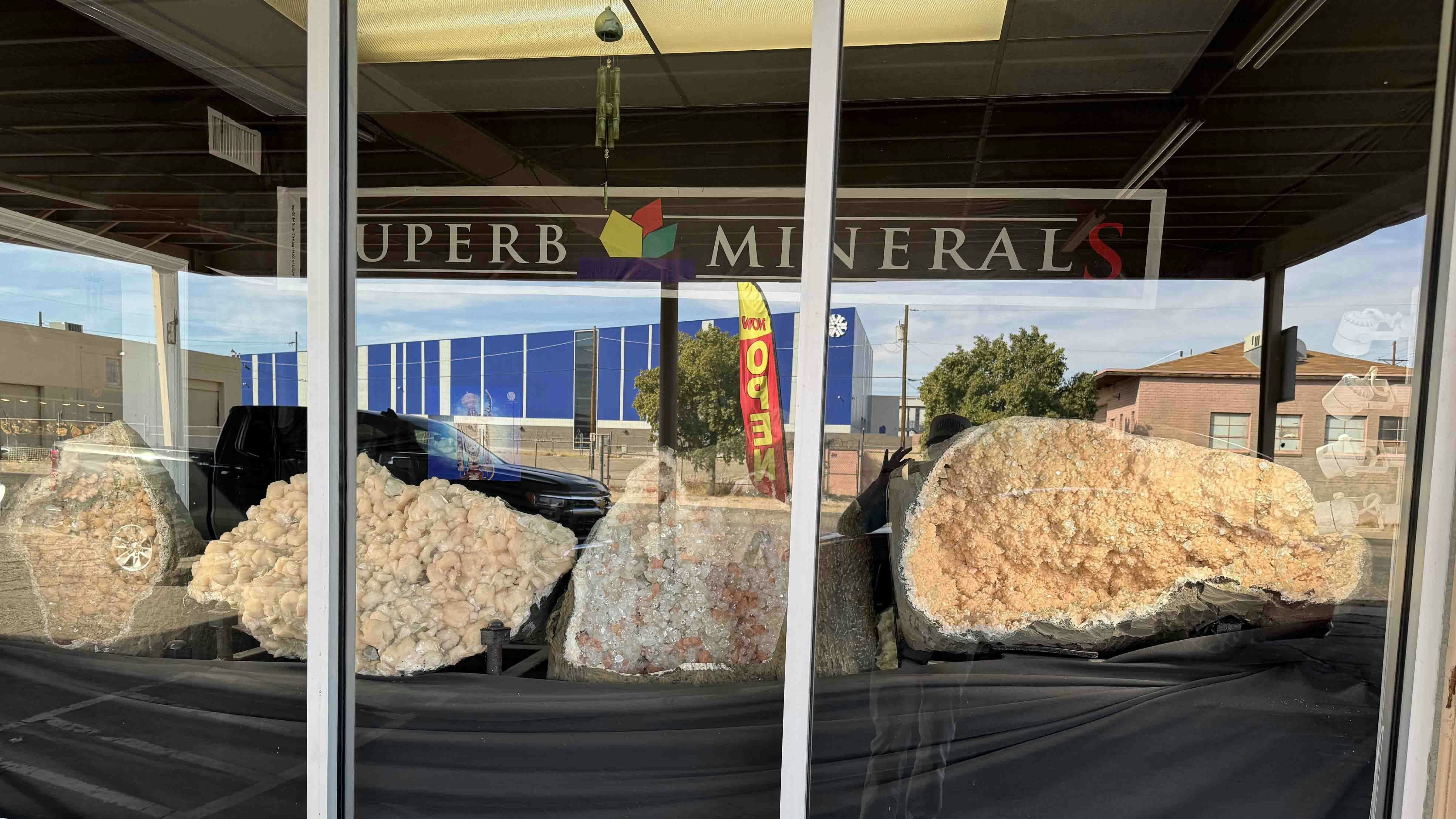 The storefront of Superb Minerals during the 2025 Tucson Gem and Mineral Show. No photos were allowed inside Superb Minerals, which contained massive mineral clusters, many large enough to be bathtubs, found in India.