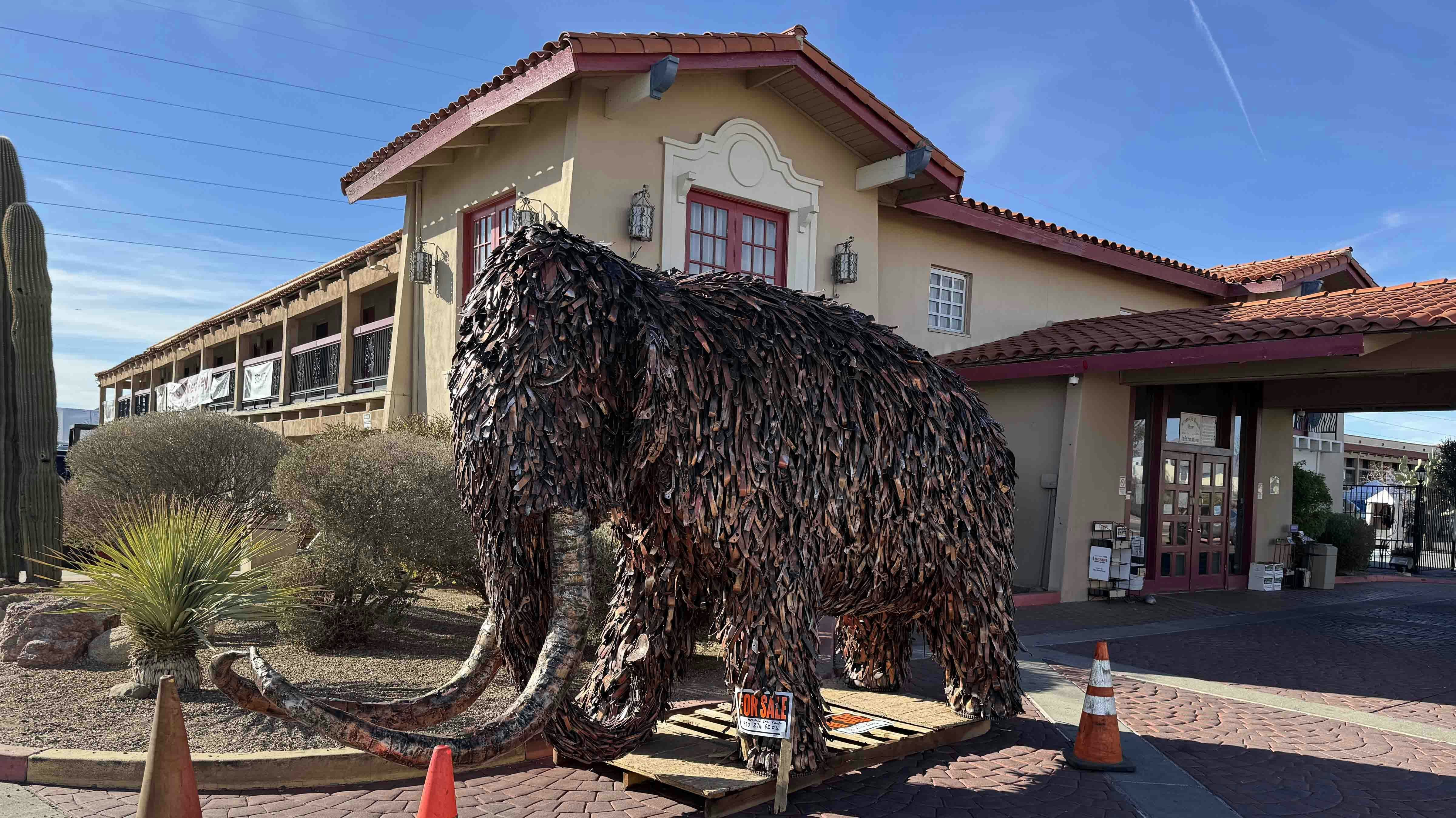 The metal mammoth greeting vendors, buyers, and visitors at the Days Inn in Tucson for the 2025 Tucson Gem and Mineral Show. The entire lower level of the hotel was open to the public, with vendors selling minerals, fossils, and other artifacts from the past.