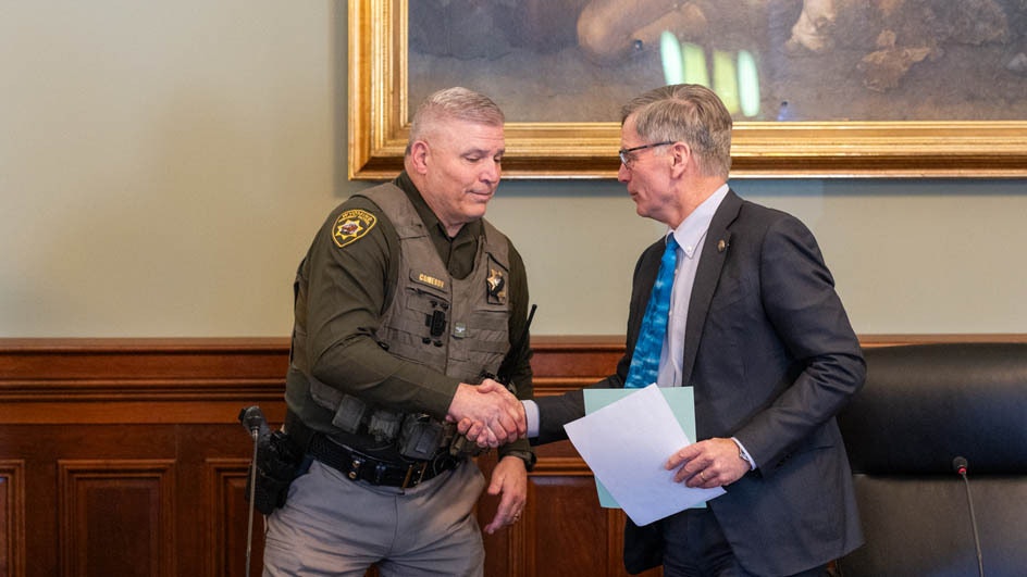 Gov. Mark Gordon (right) and Wyoming Highway Patrol Col. Timothy Cameron
