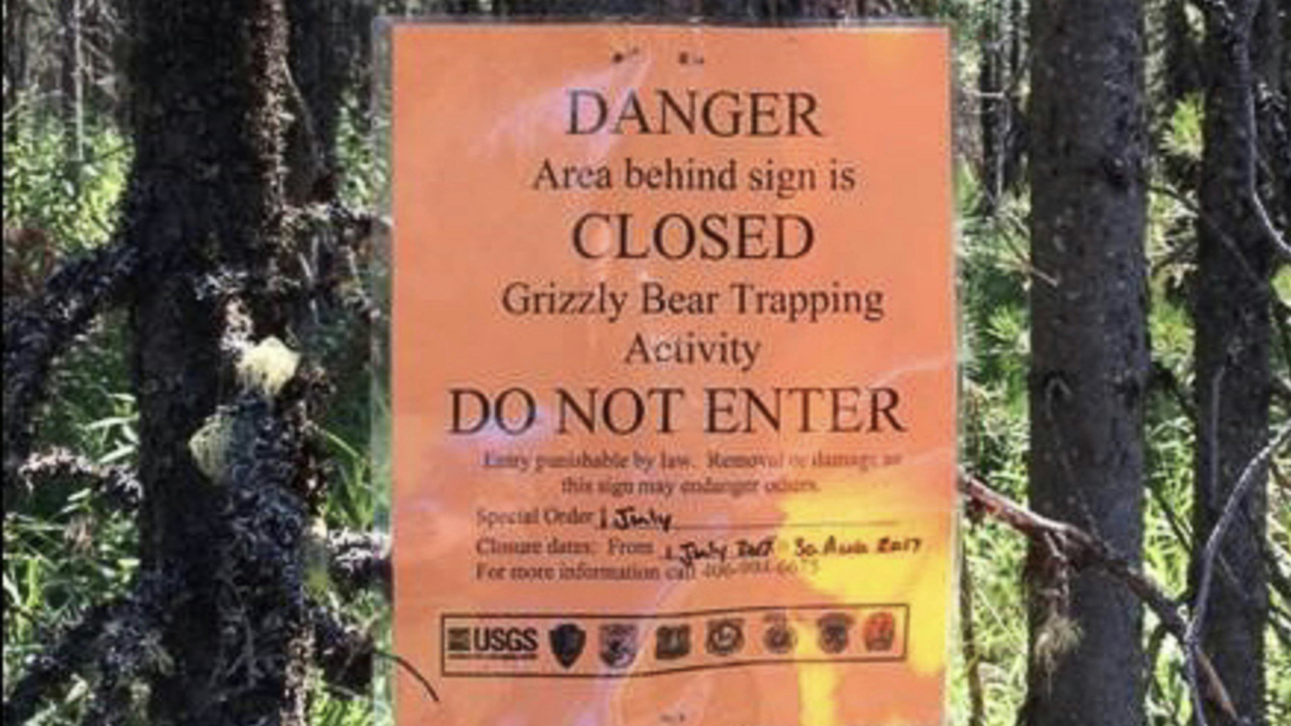 Grizzly bear trapping sign scaled