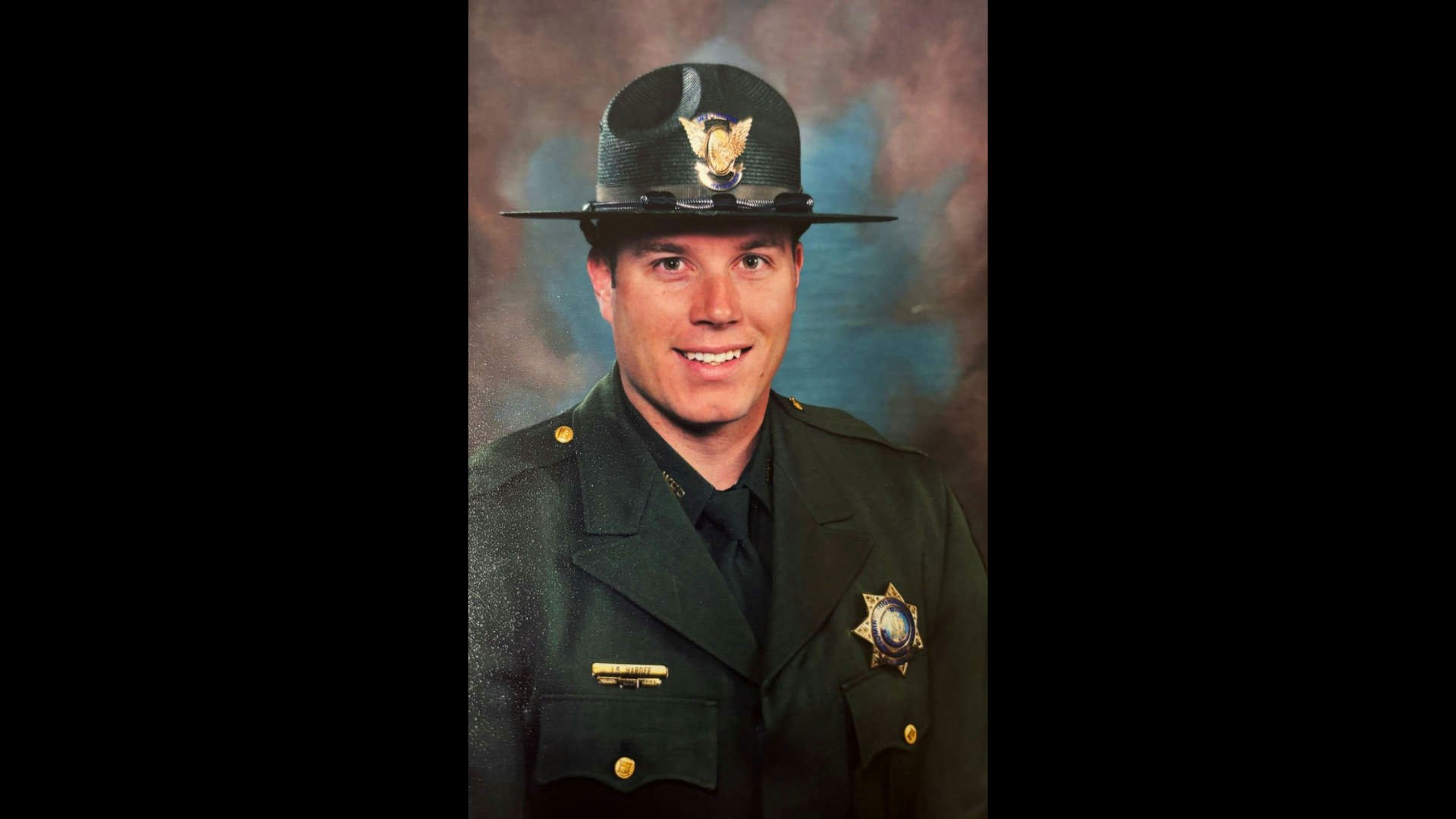 A portrait photo of Josh Hardee in the Wyoming Highway Patrol.