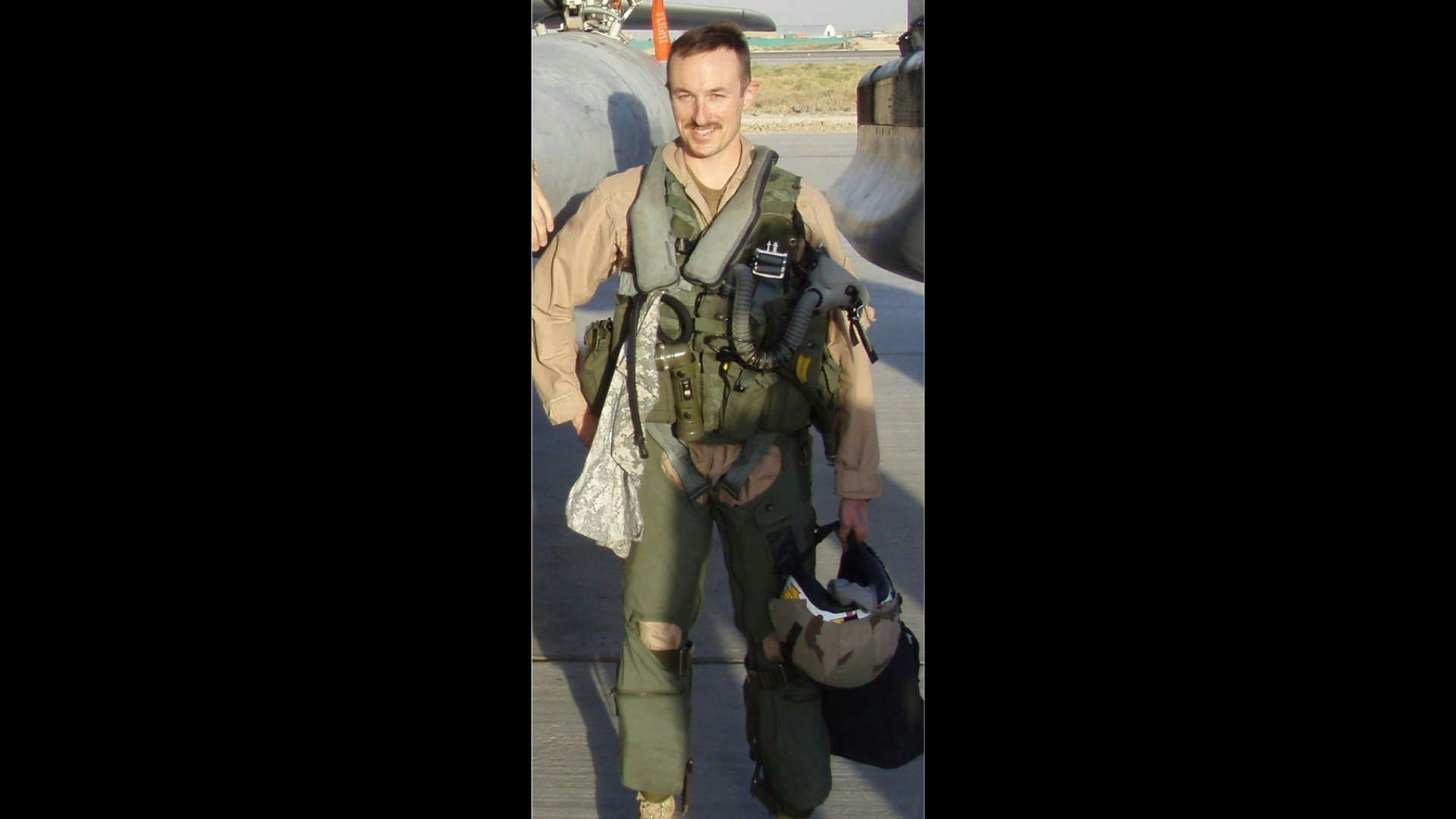 A photo of Sean Michaels working in the US Navy.