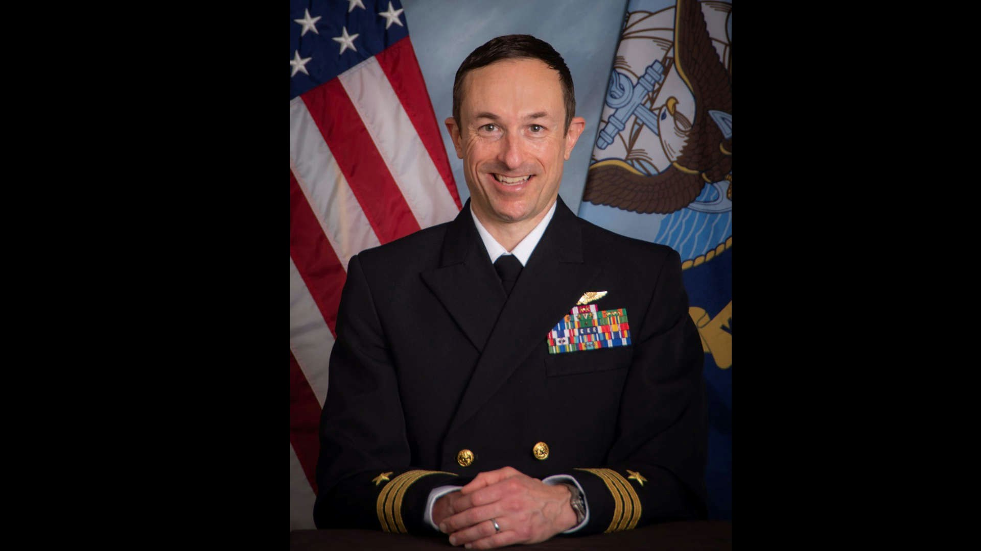 A portrait photo of Sean Michaels in the US Navy.