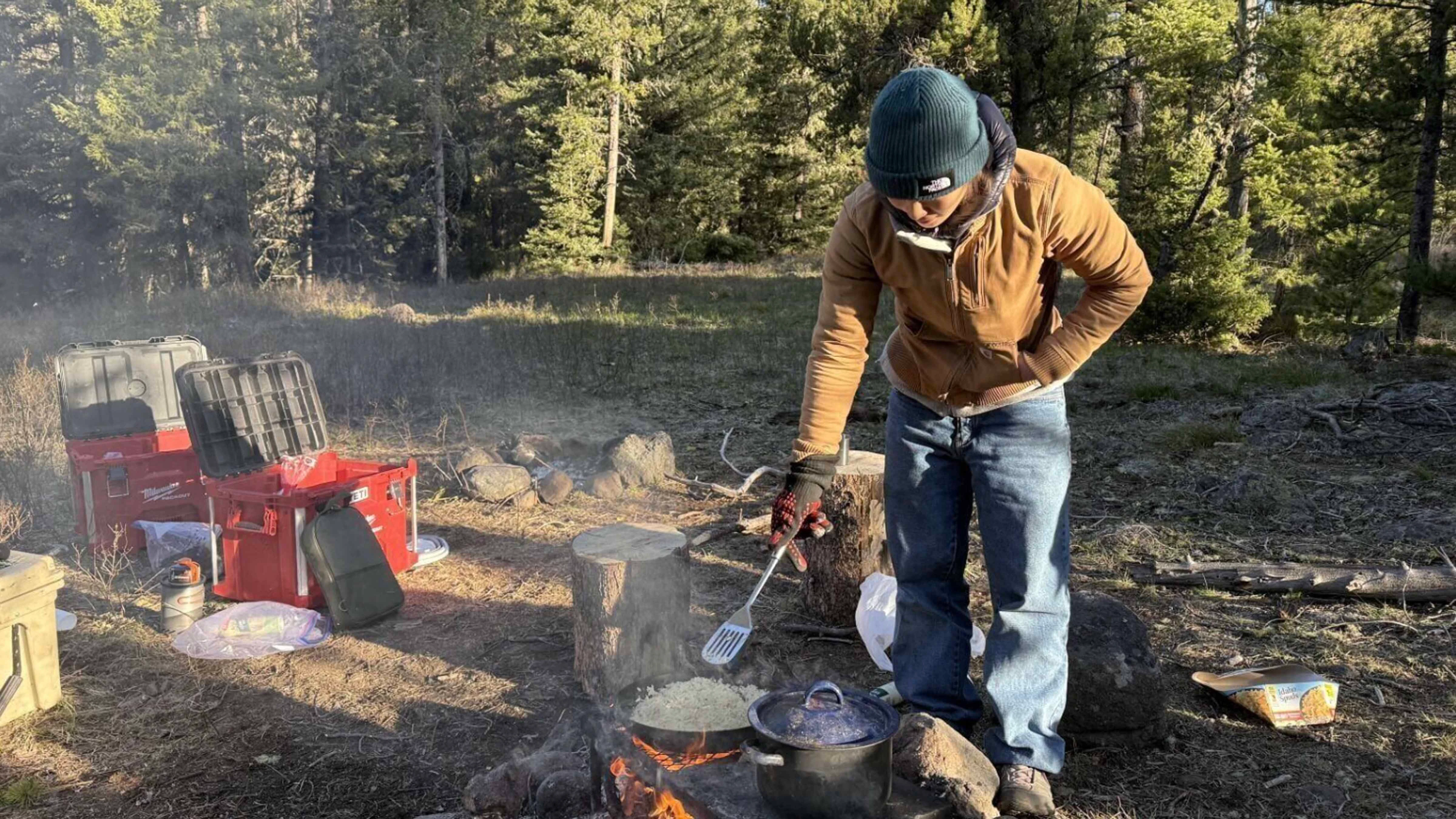 Cooking the final breakfast over an open fire.