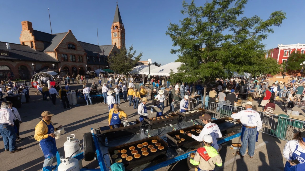 Pancakes fly at the Cheyenne Frontier Days Pancake Breakfast in downtown Cheyenne on Monday, July 20.