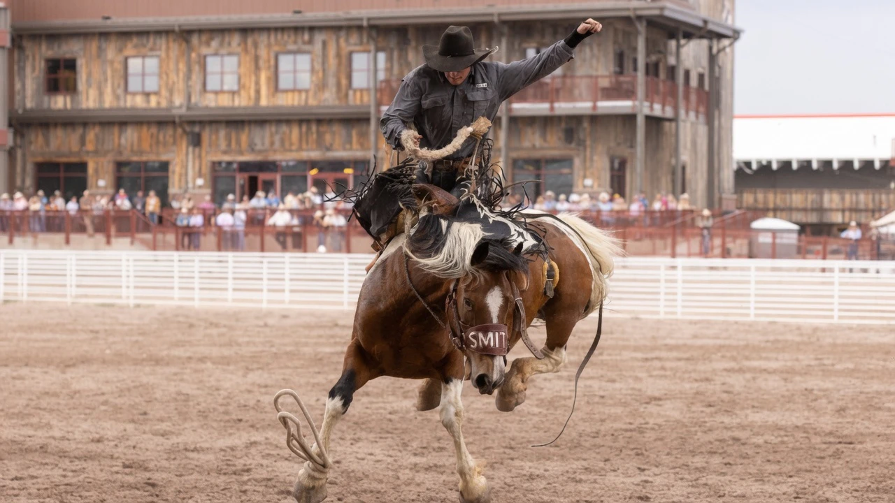 Rylan Cherry from Buna, TX, in the rookie saddle bronc riding at the Cheyenne Frontier Days Rodeo on Wednesday, July 22.