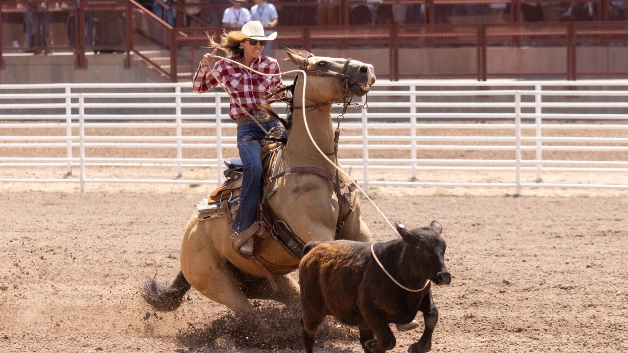 K.L. Collmorgen from Byers, CO, in the breakaway roping at the Cheyenne Frontier Days Rodeo on Wednesday, July 22.