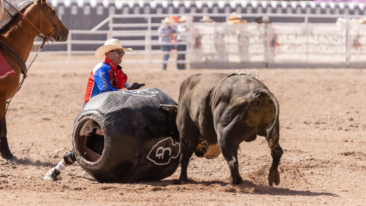 Bullfighter Cody Webster fights a bull after a ride with barrel and barrelman Cody Sosebee in the barrel at the Cheyenne Frontier Days rodeo on Friday, July 17.