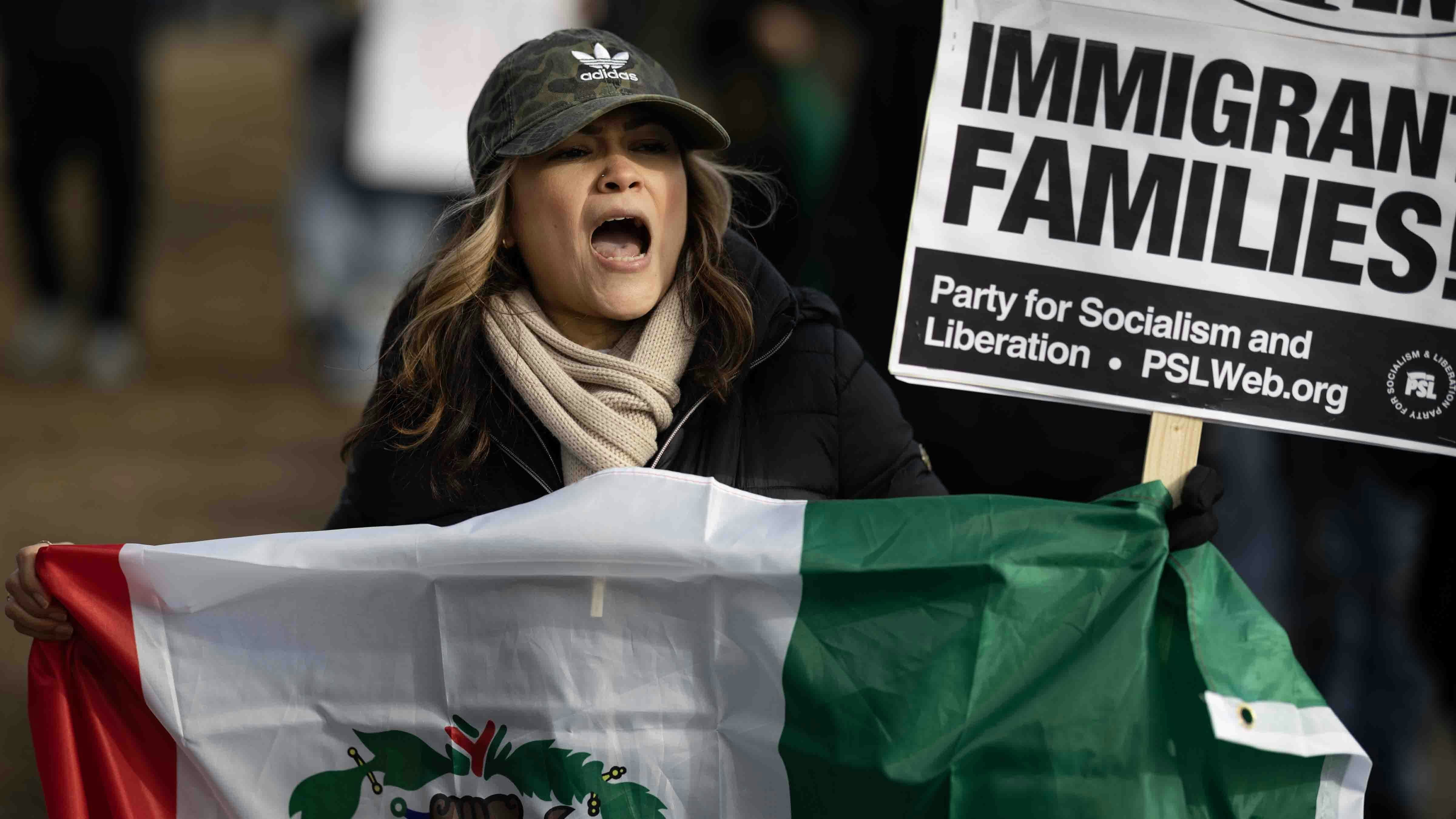 Demonstrators hold a rally and march to protest a recent increase of activity in the area by Immigration and Customs Enforcement (ICE) agents on February 01, 2025 in Waukegan, Illinois.