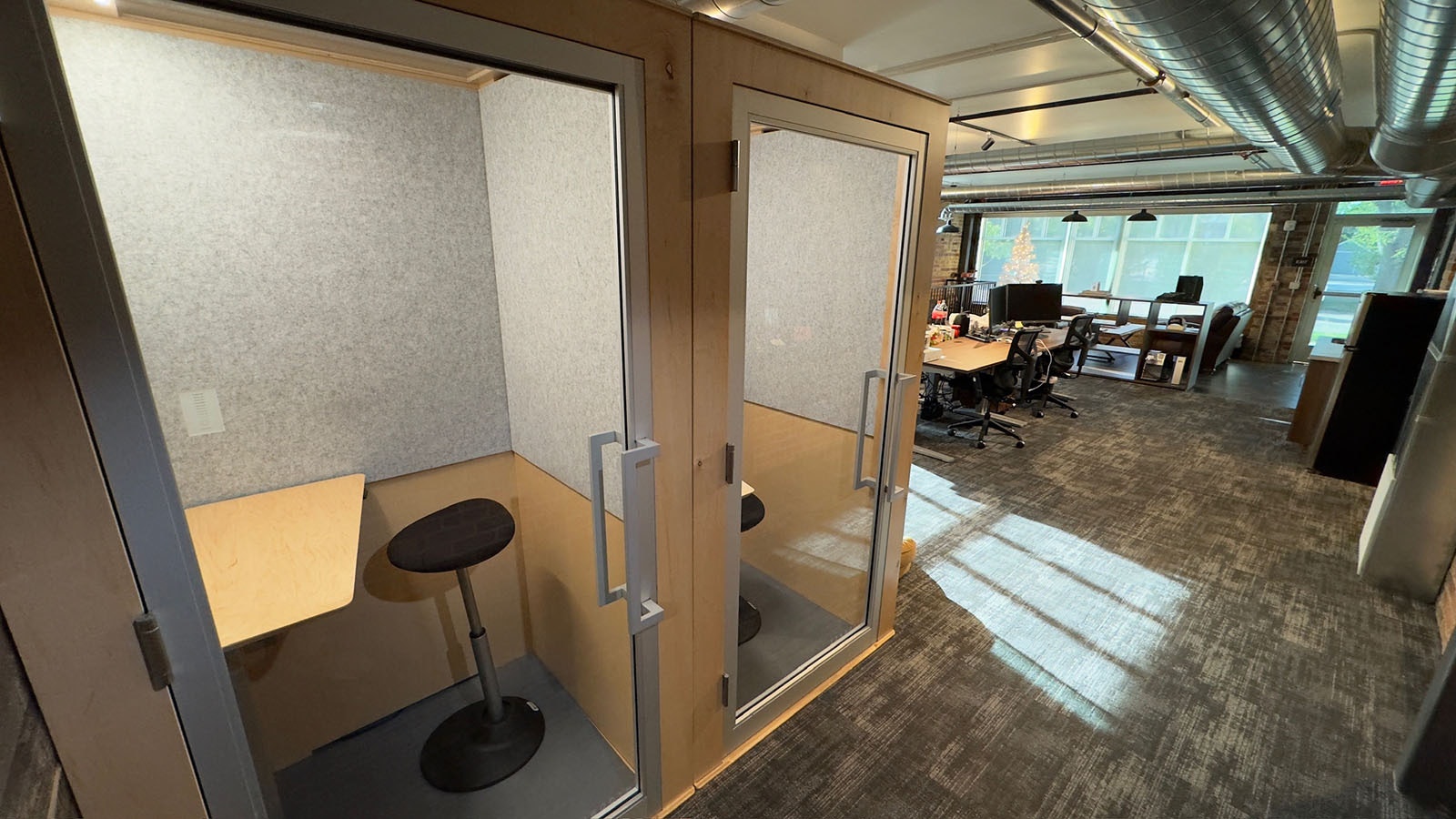 Right off the newsroom are a pair of sound-dampening cubbyholes dubbed the "phone booths" where reporters can go to conduct interviews or get a little more privacy than the open newsroom.