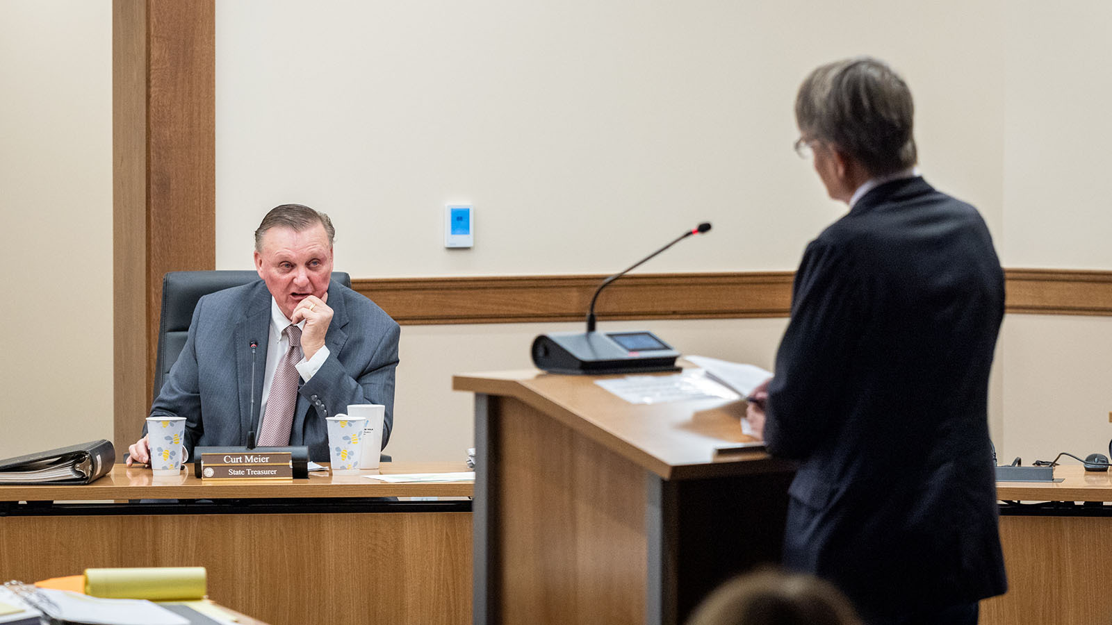 State Treasurer Curt Meier, left, questions Jackson Vice Mayor Arne Jorgensen about a new affordable housing project on the Teton County Fairgrounds.