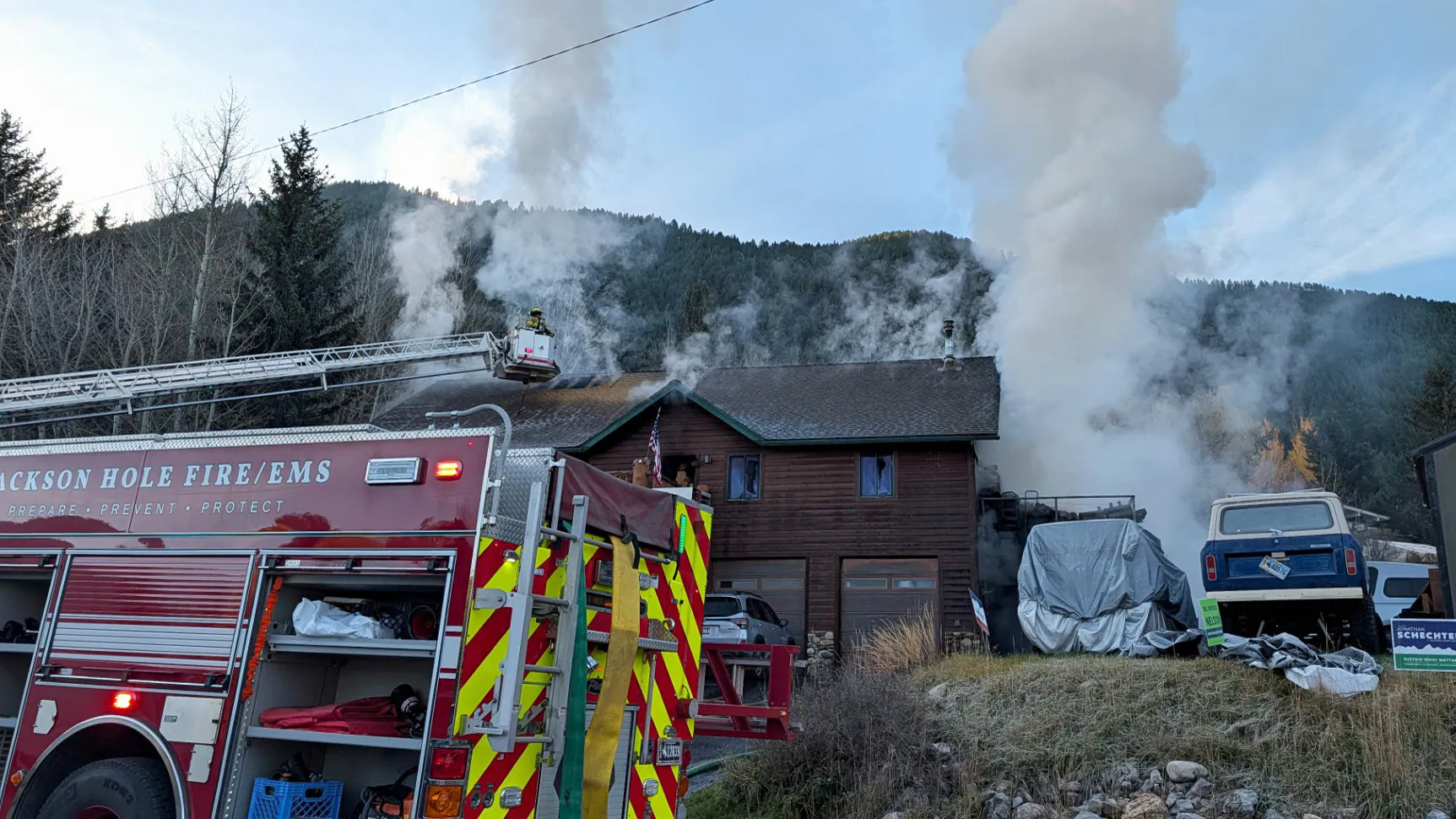 Local fire crews battle a fire Thursday morning at the Rooks’ home on Flat Creek Drive in Jackson