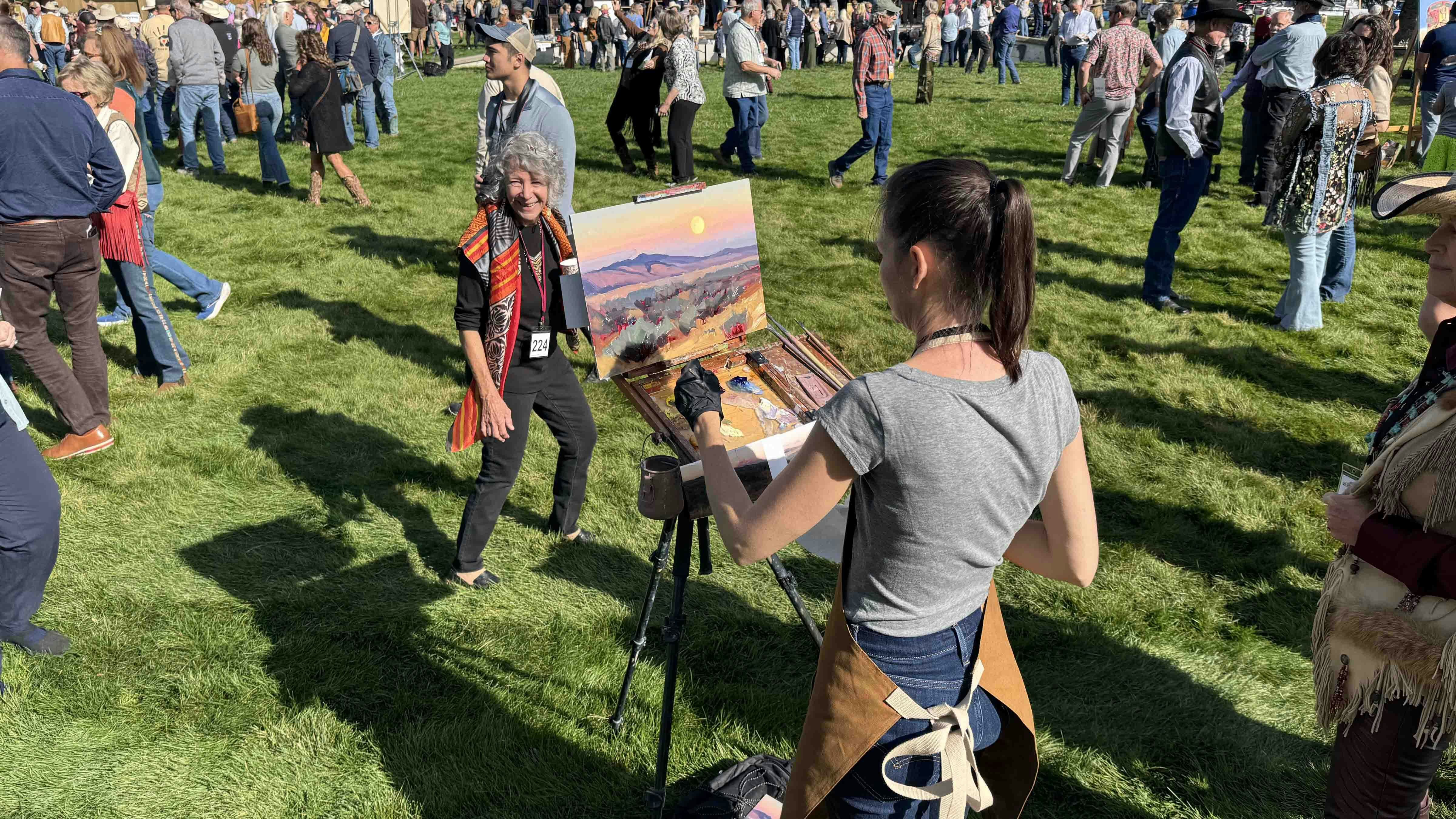 Jessica Garrett-Lawrence works on a painting during the 44th Buffalo Bill Art Show and Sale's Saturday morning Quick Draw. Her piece sold for $2,250.