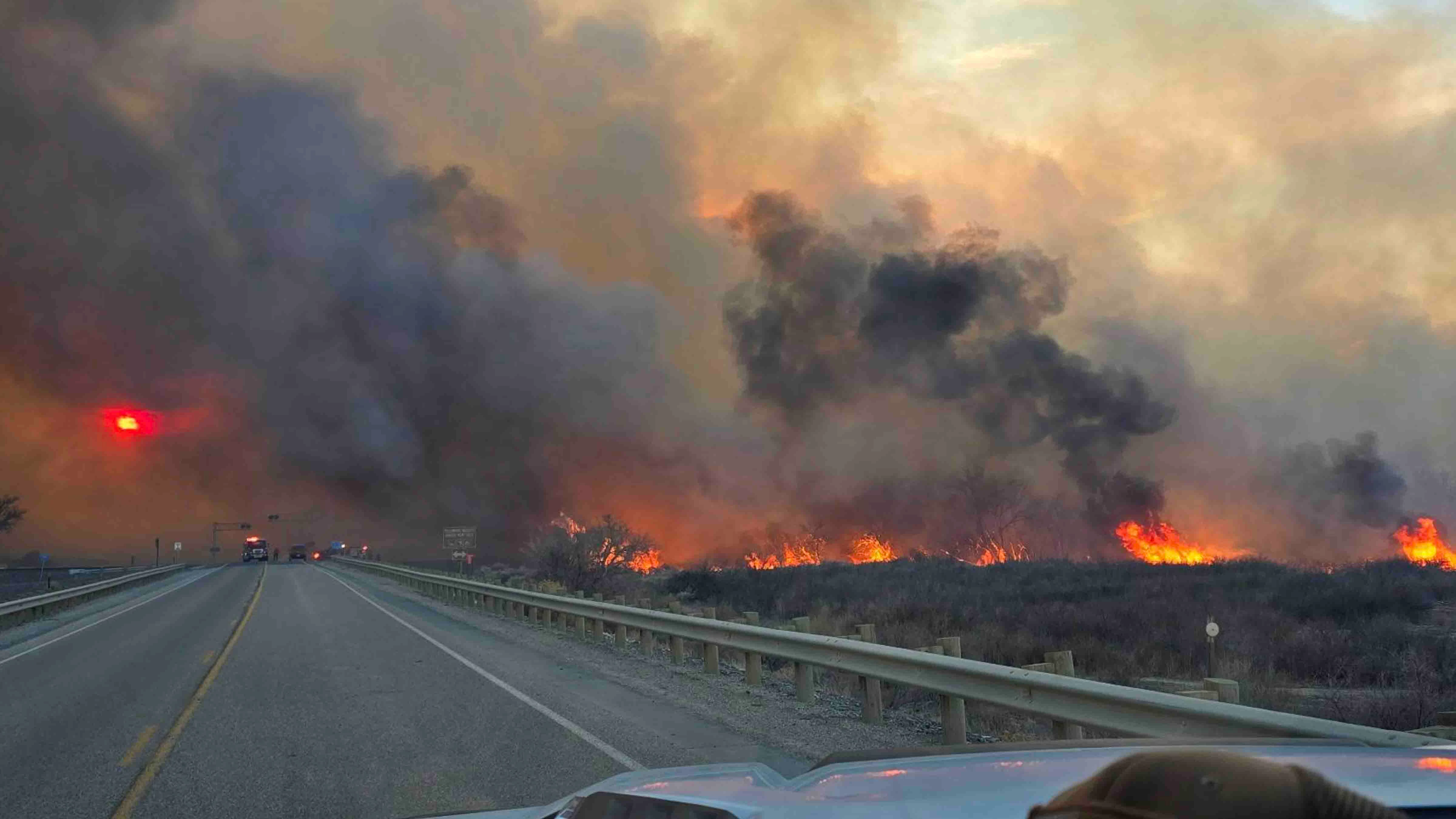 Firefighters now believe the Kane Fire just north of Lovell is human-caused. They also say the 1,900-acre fire, which is now 30% contained, has the behavior of "an August blaze."