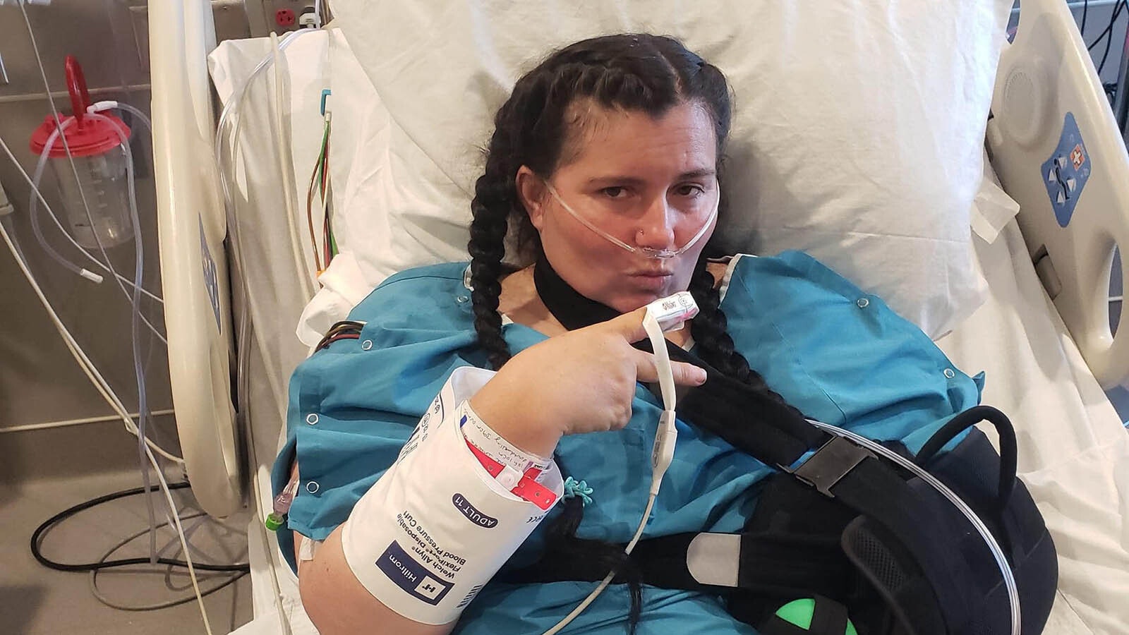 Karen Smith is recovering after she was stabbed in the back last month. The family is now raising money for her medical bills, while her teen son has been charged as an adult for allegedly stabbing her.