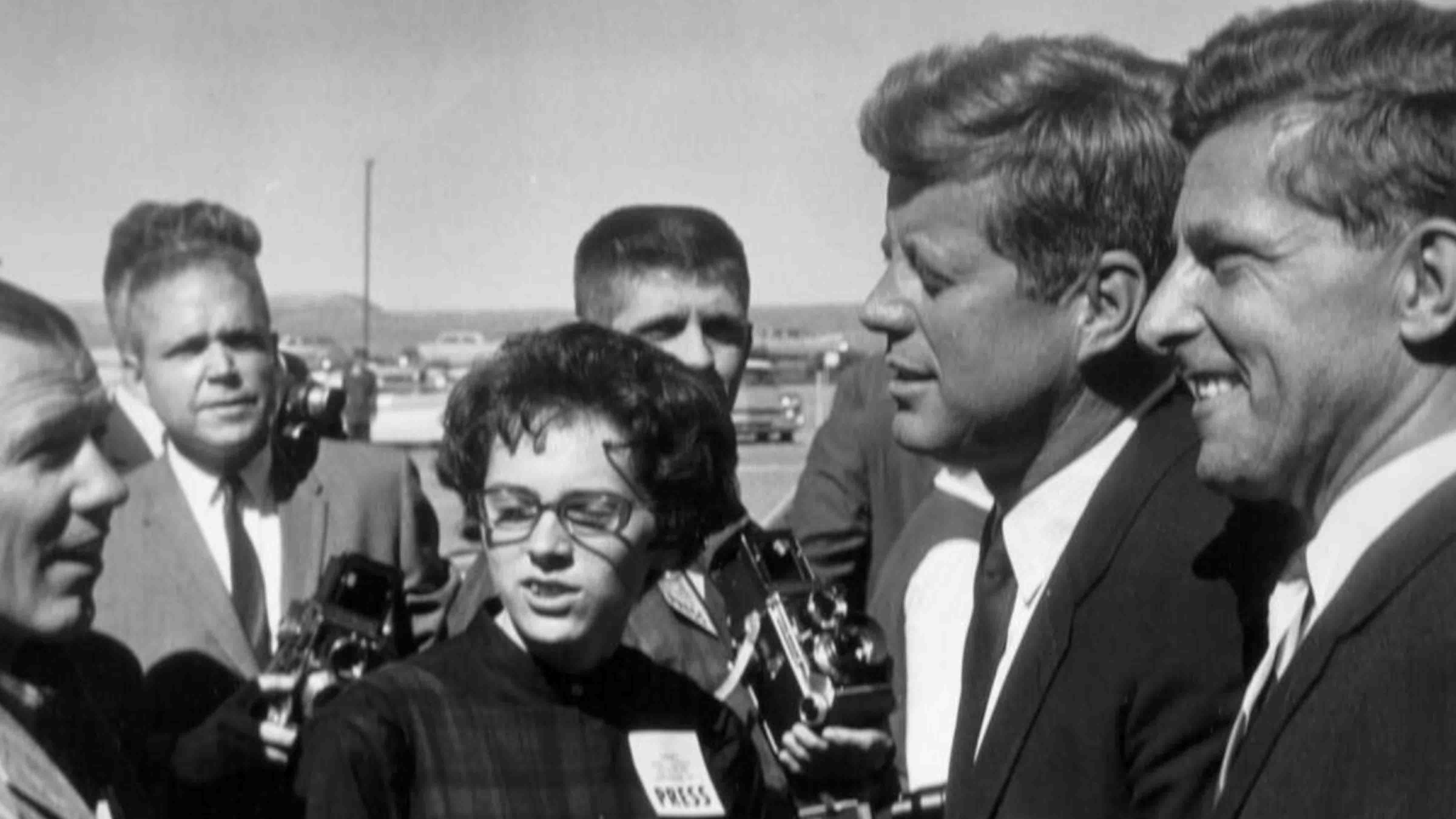 University of Wyoming Branding Iron Editor Kathy Karpan, center, with John F. Kennedy and Wyoming's U.S. senator, Gale McGee, right, outside the UW field house, Sept. 25, 1963