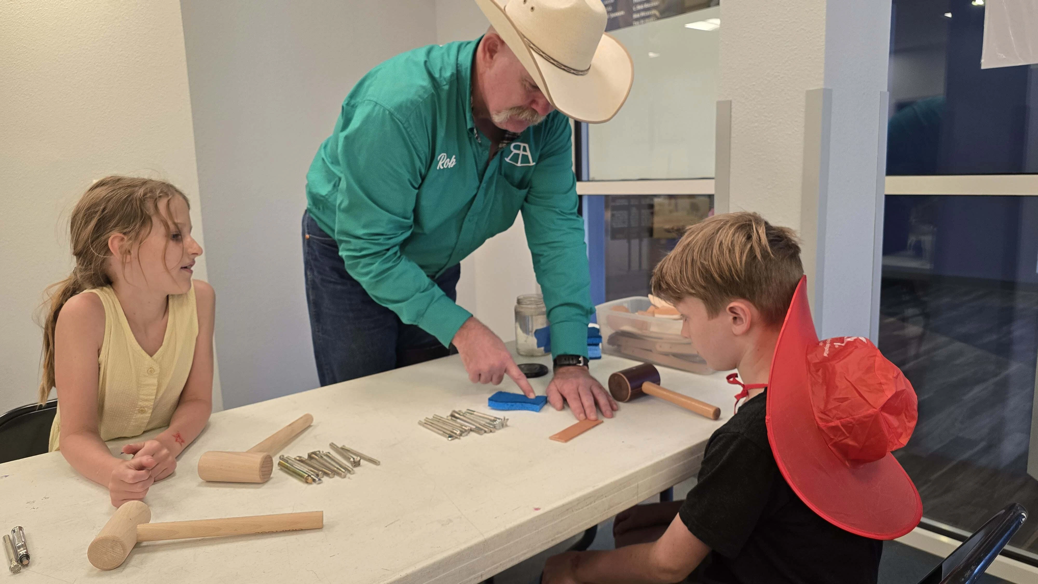 The sound of pounding hammers and children giggling rang at the Old West Museum during Cheyenne Frontier Days — a symphony to Cheyenne’s leatherman, Rob Underwood, there to demonstrate an old-world skill to a brand-new generation.