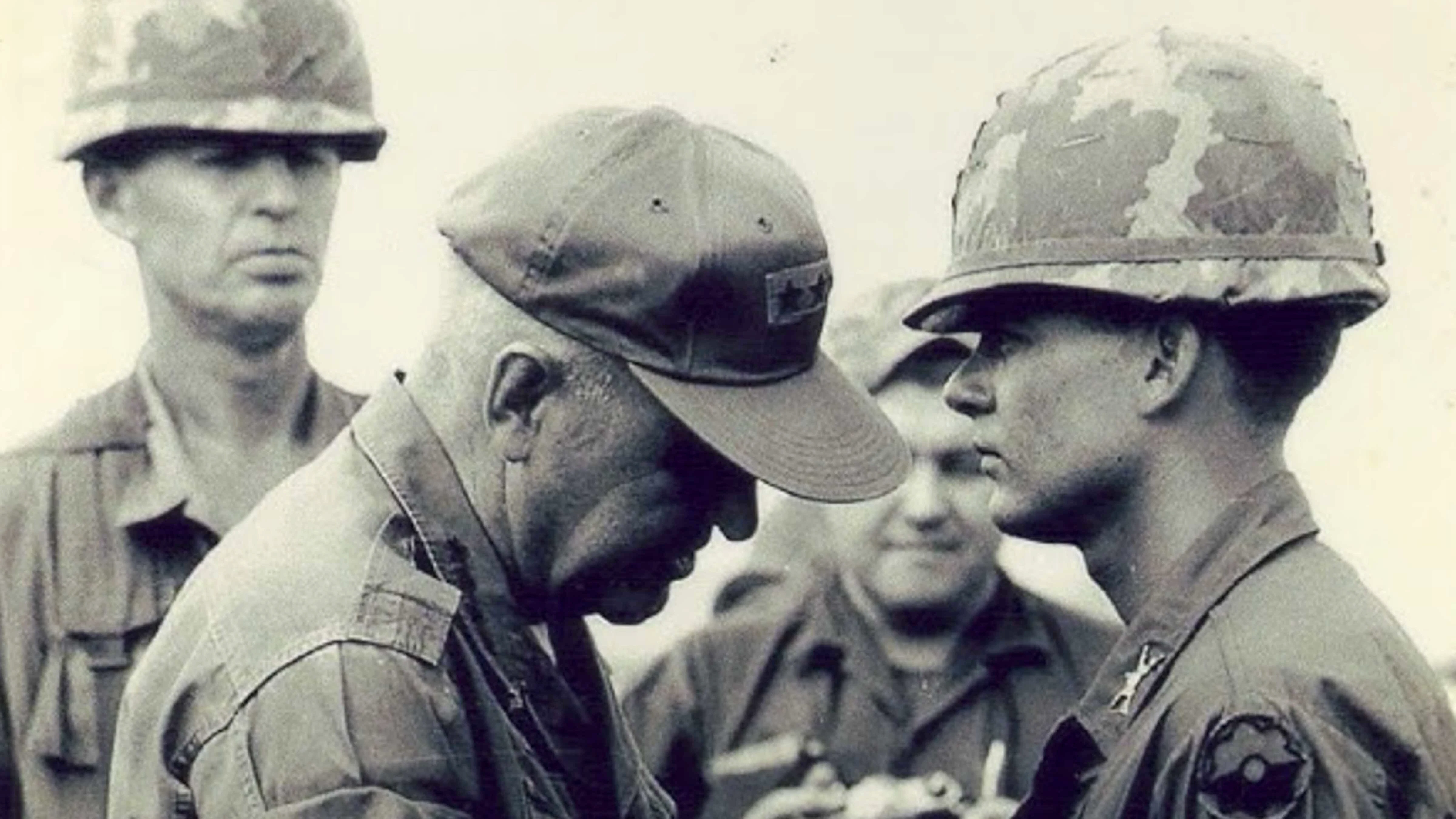 Lee Alley - General Clayton Adams pins the Distinguished Service Cross on 1st Lt. Lee Alley.