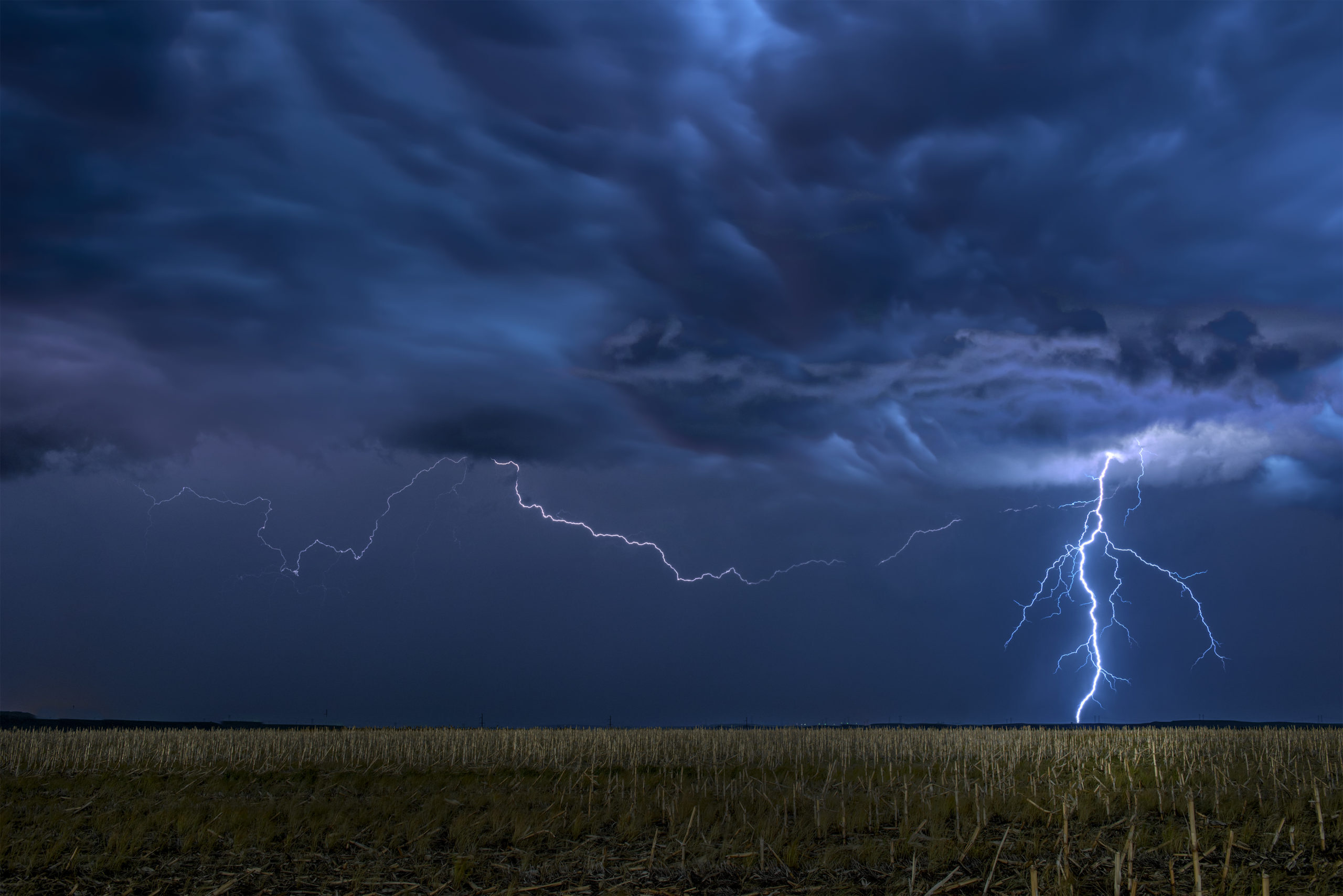 Lightning storm over field in oklahoma 637 KGTD scaled