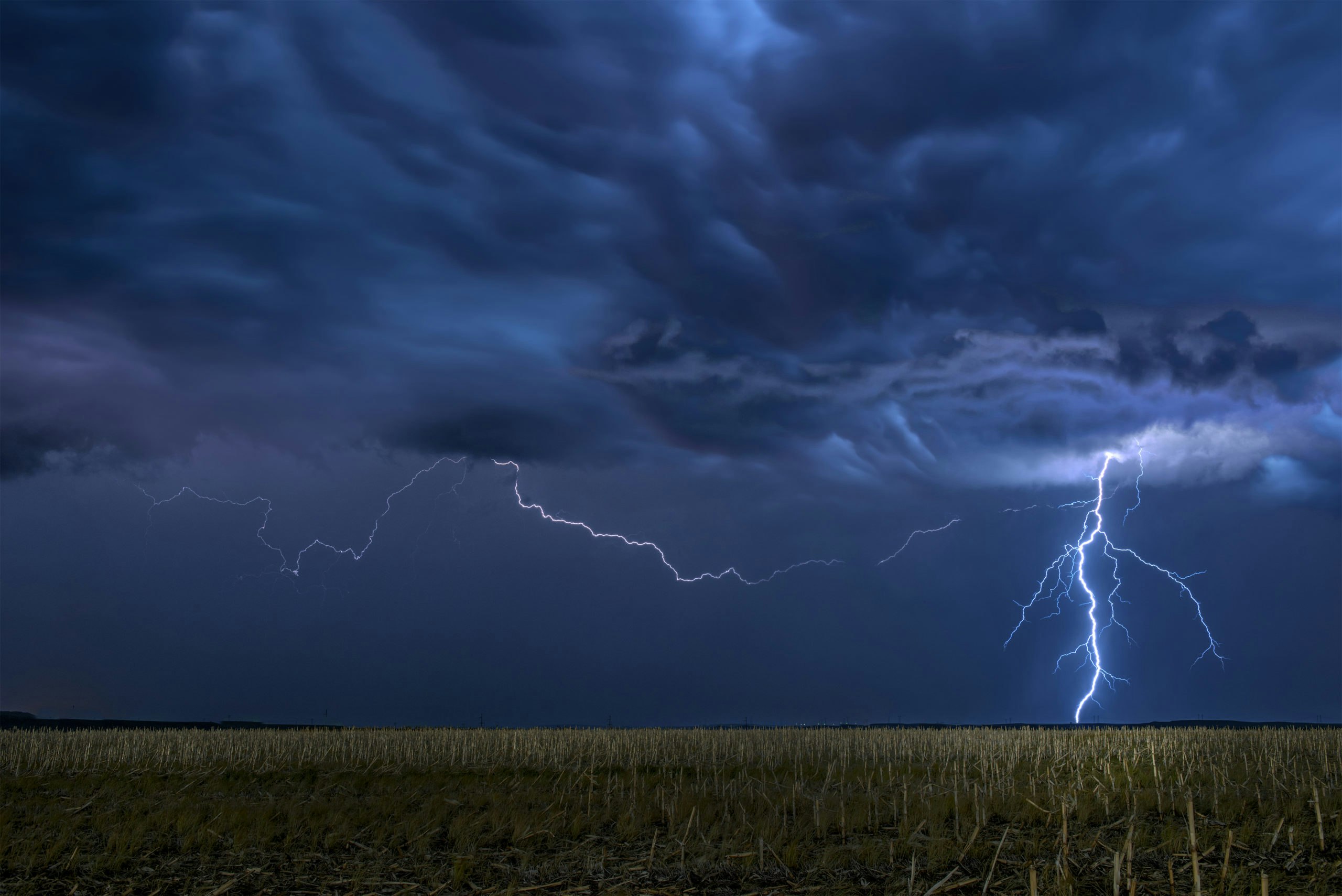 Lightning storm over field in oklahoma 637 KGTD scaled
