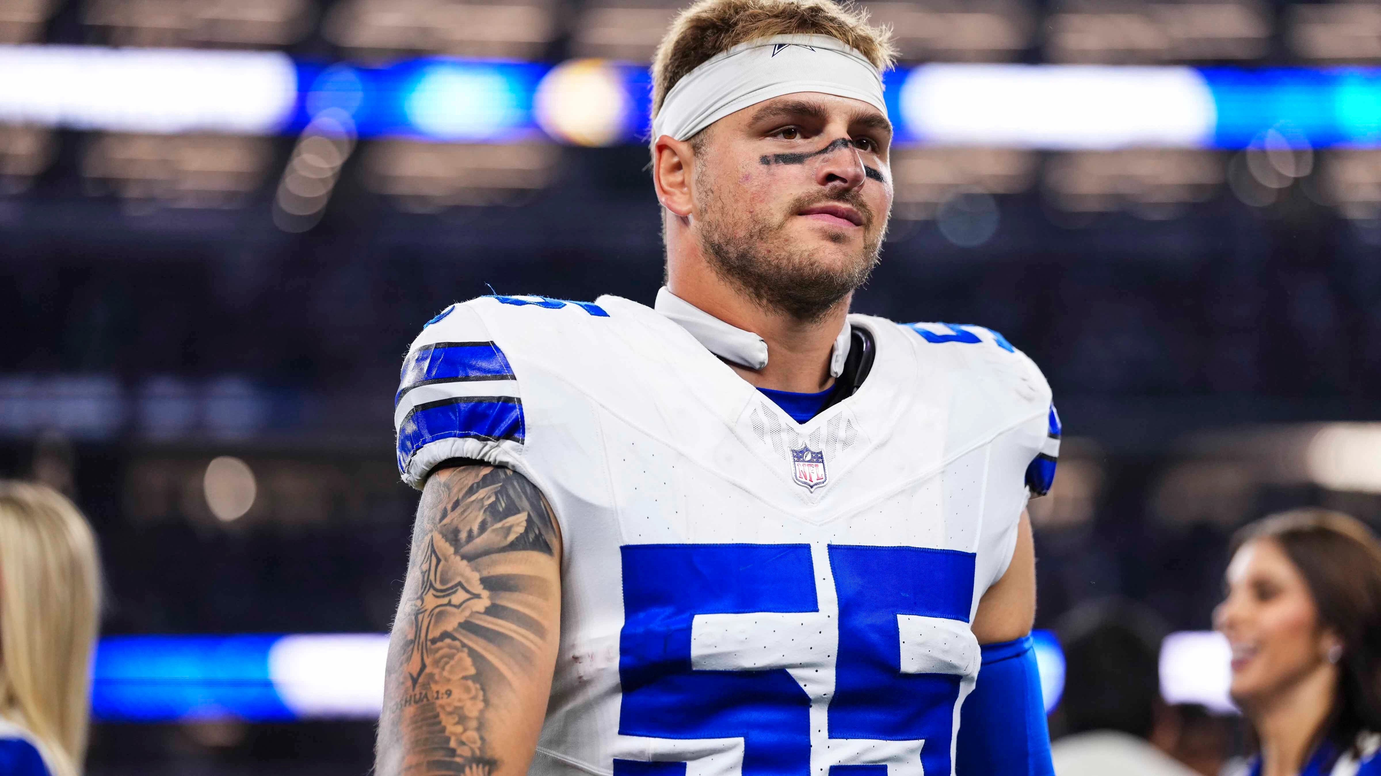 Logan Wilson #55 of the Dallas Cowboys exits the field after an NFL football game against the Philadelphia Eagles at AT&T Stadium on November 23, 2025 in Arlington, Texas.