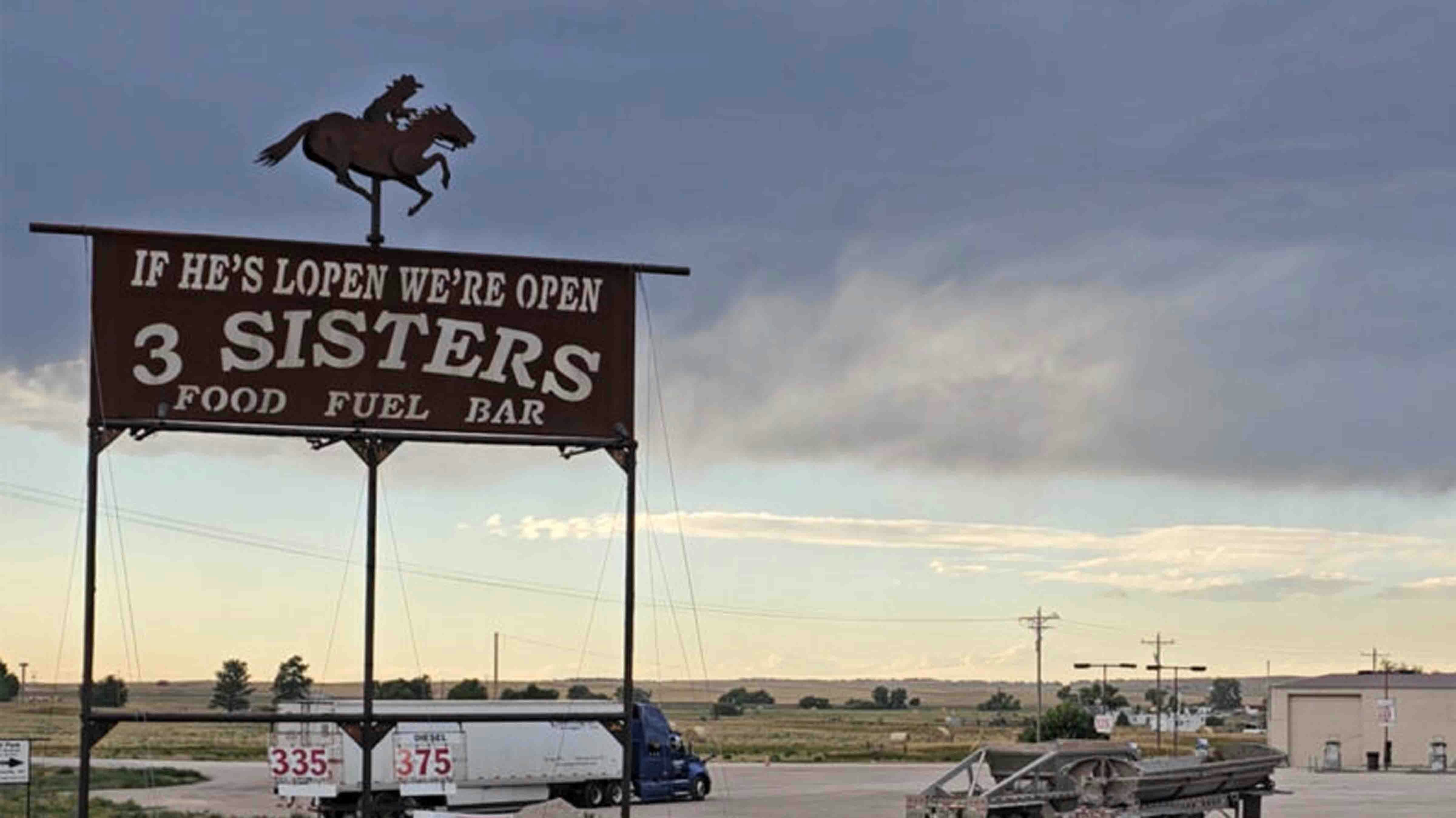 As the sign says, if the horse is lopen, the 3 Sisters Truck Stop in Manville, Wyoming, is open.