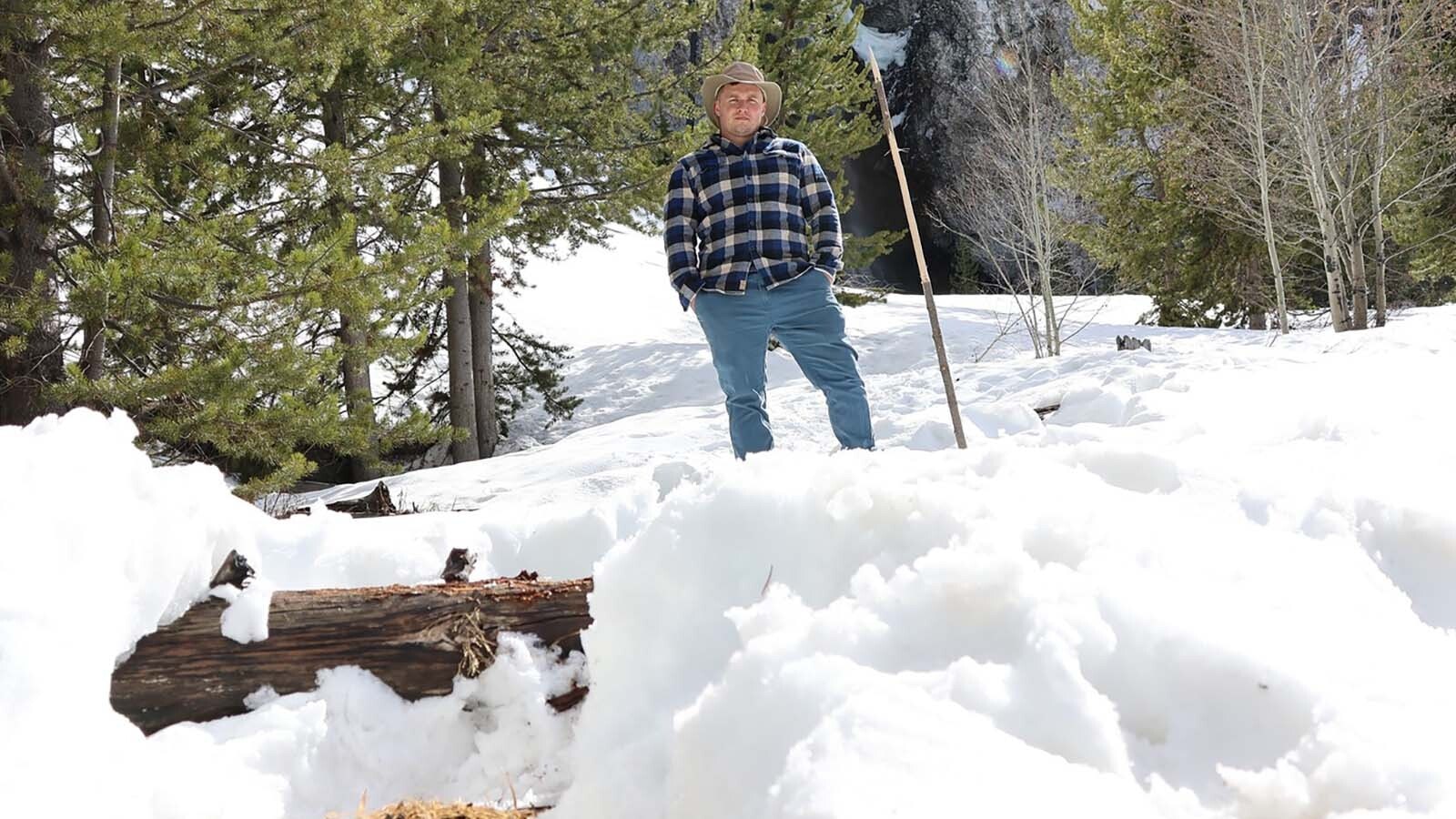 Lucas Fussner stands in the snow on the Fairy Falls Trail in Yellowstone National Park.