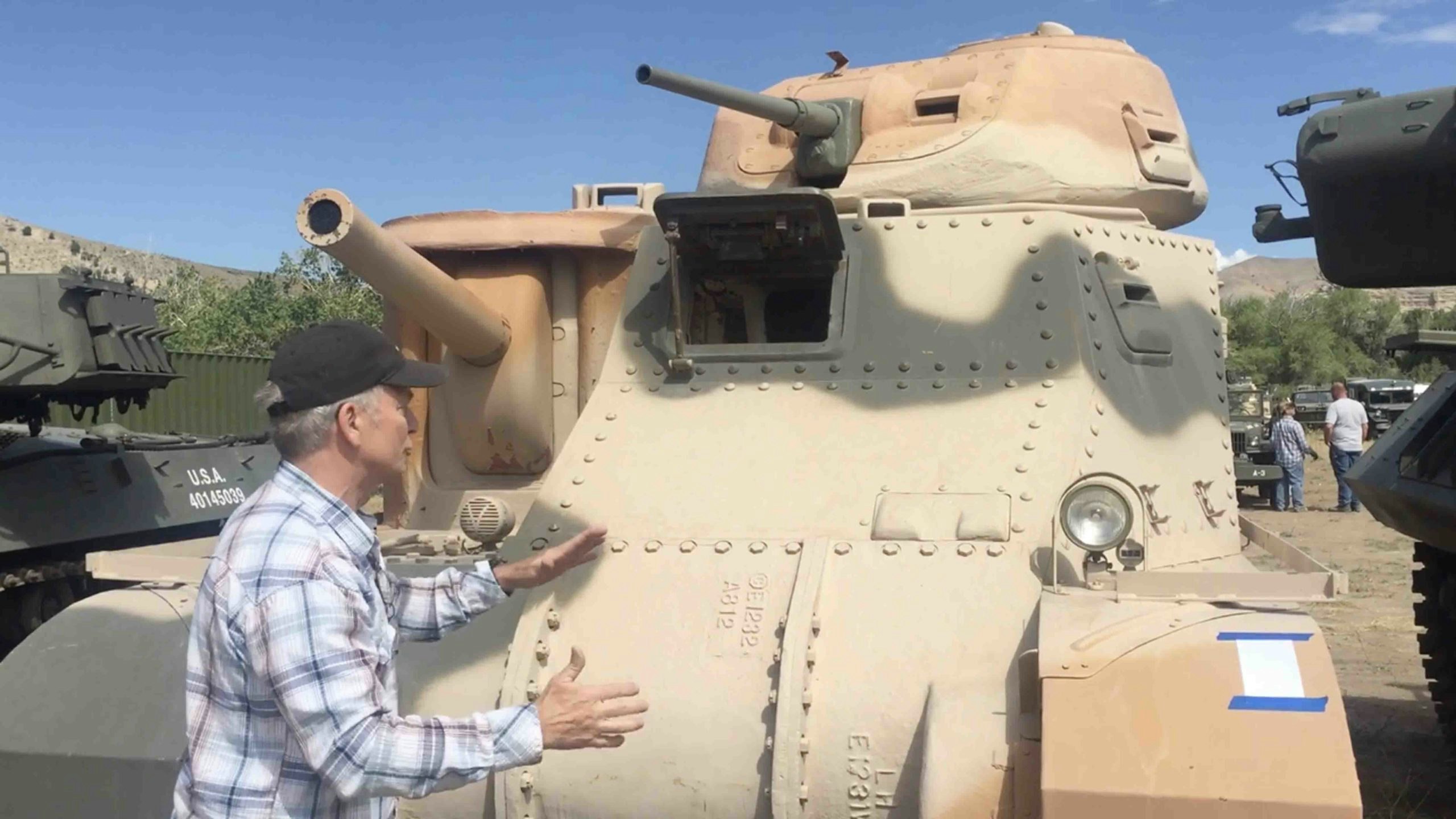 Man with tank scaled