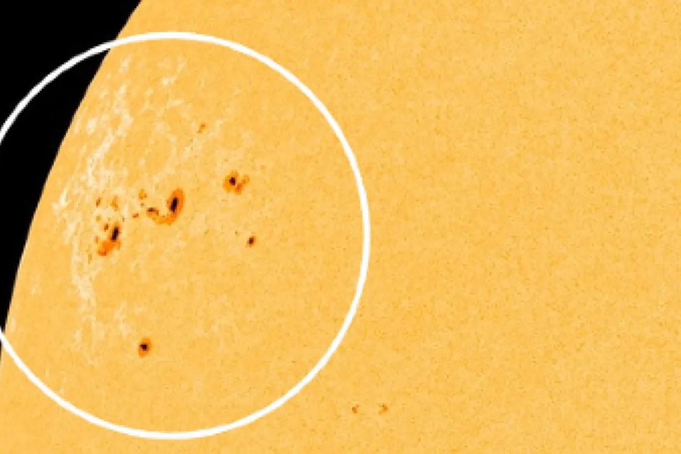 A giant sunspot archipelago, or a collection of sunspots, on the surface of the sun covers an area more than 15 times the width of Earth.