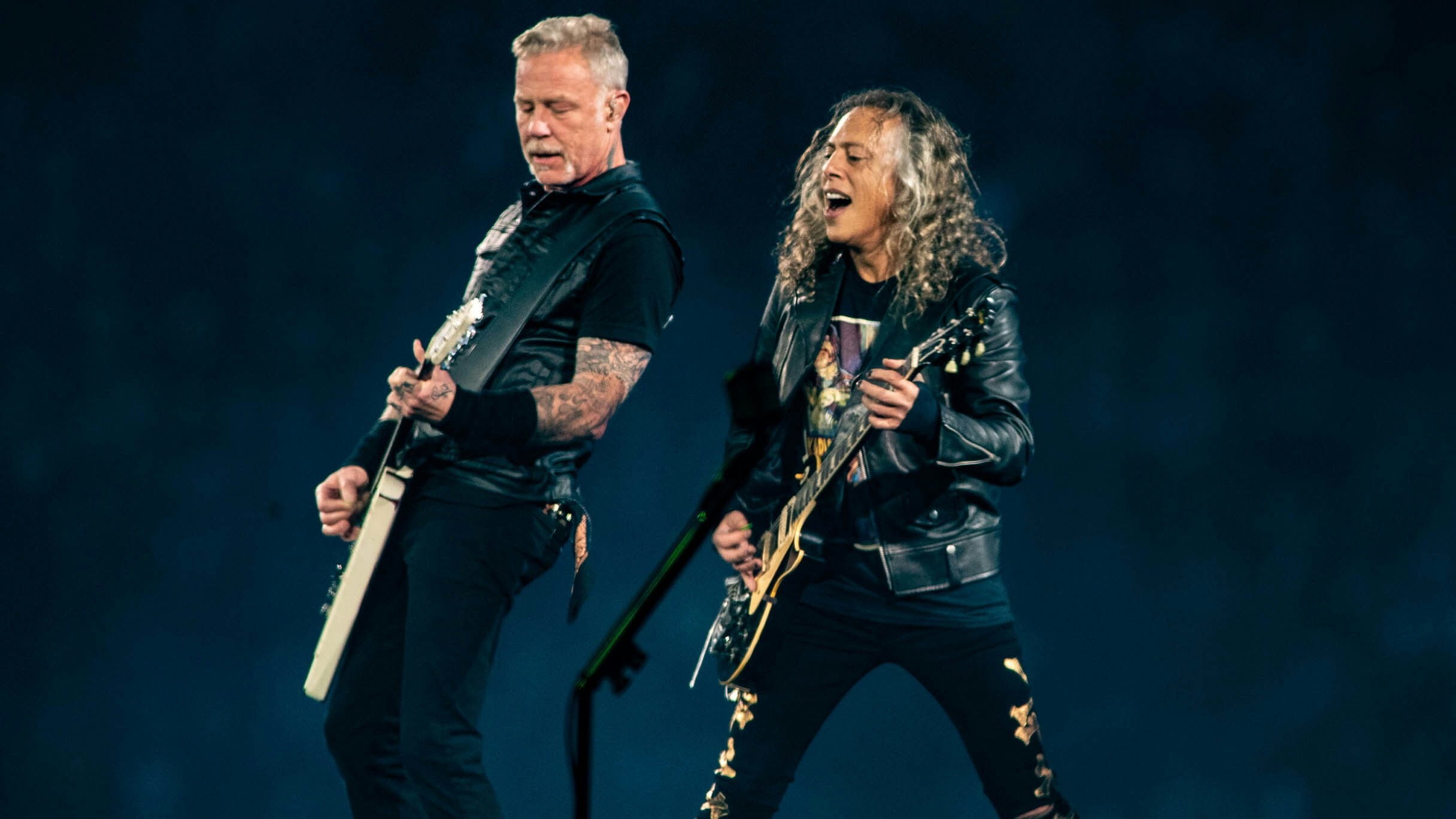 James Hetfield and Kirk Hammett of Metallica perform on stage at Johan Cruijff Arena on April 29, 2023 in Amsterdam, Netherlands.