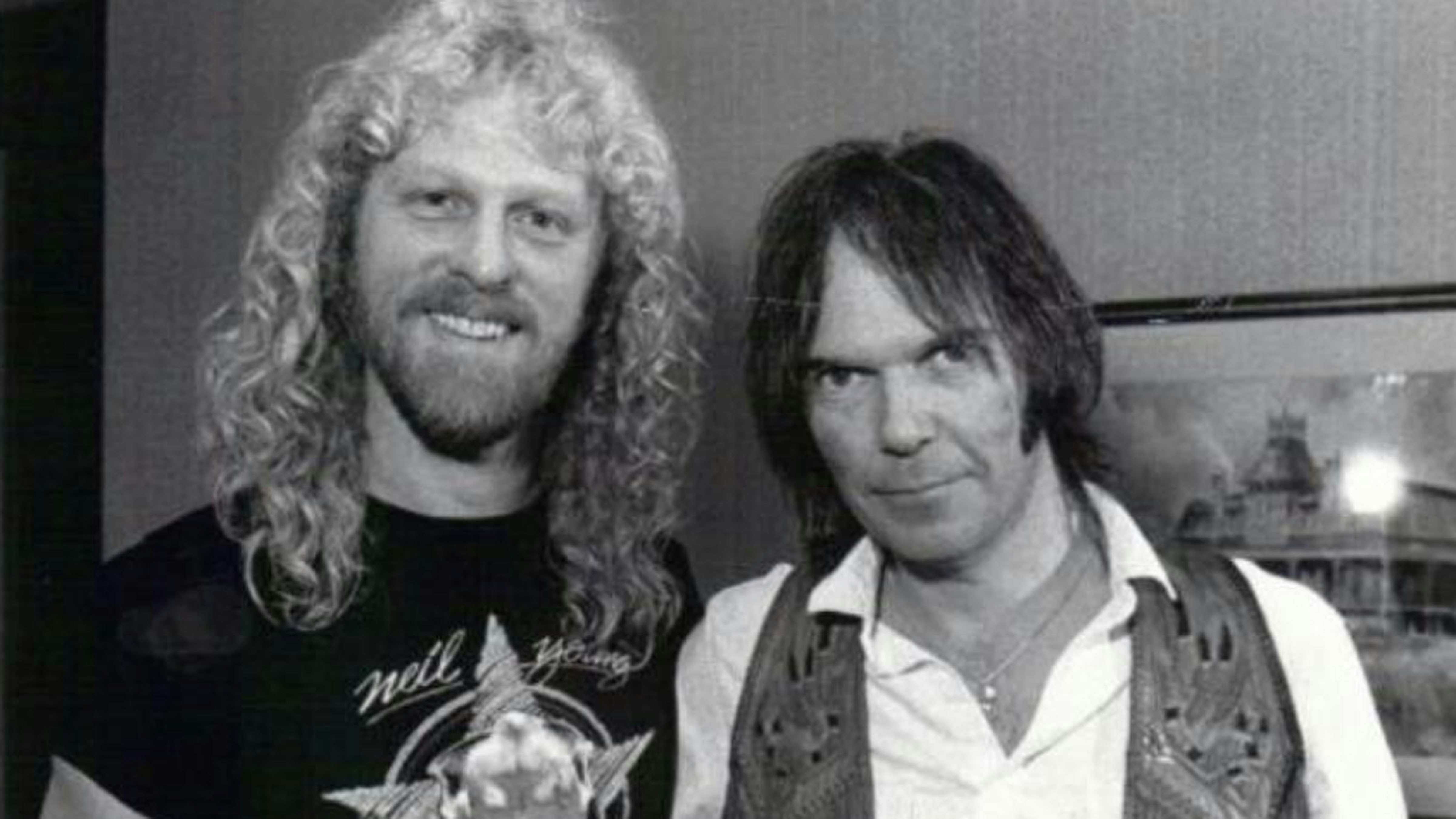 Michael DeGreve and Neil Young at benefit concert following 1985 flood in Cheyenne