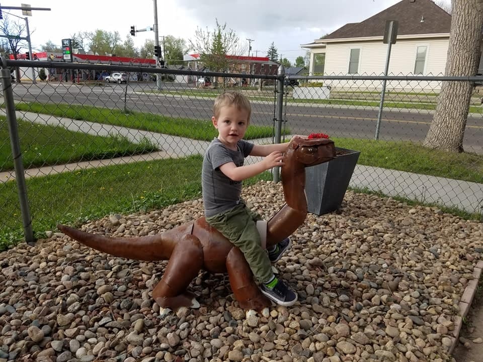 Dino, a small brontosaurus sculpture, was stolen from a Cheyenne family's yard last week.
