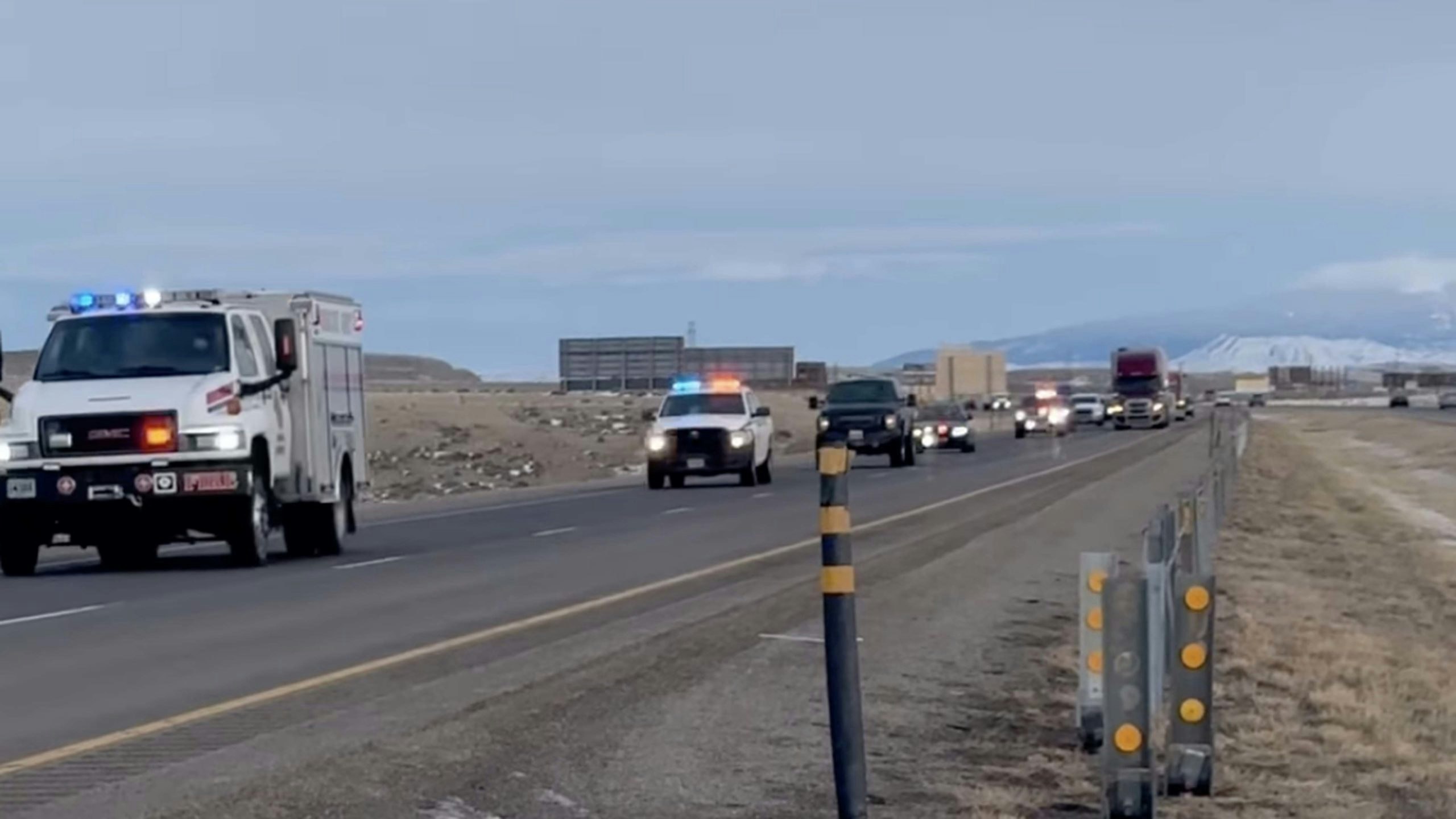A motorcade of emergency vehicles in Carbon County honor EMTs Tyeler Harris and Tiffany Gruetzmacher. Harris was killed and Gruetzmacher suffered serious injuries when a semi-truck hit them in a snowstorm as they were responding to a two-vehicle accident.