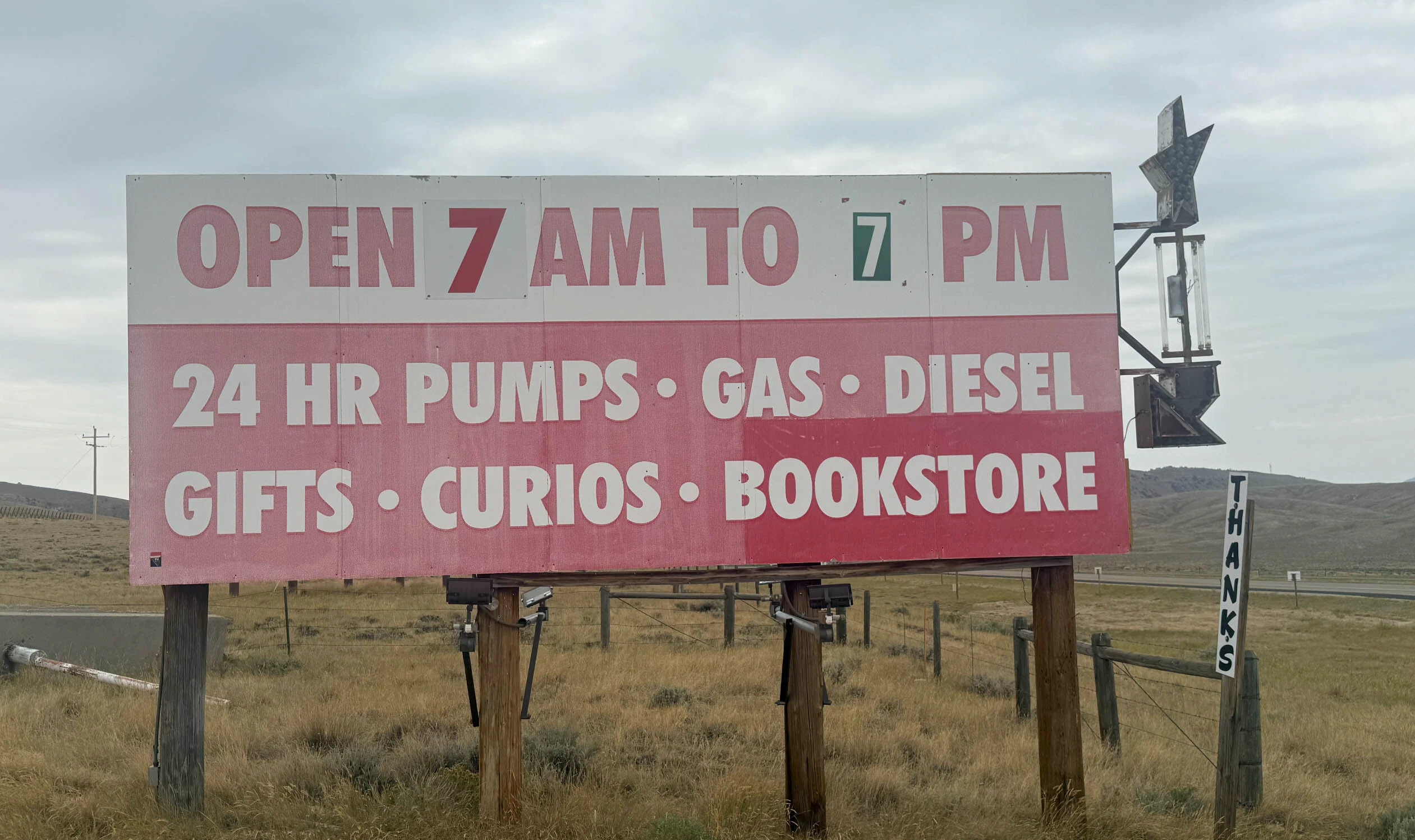 Regular unleaded sells for $5.999 a gallon at Three Forks Muddy Gap Service, where 24-hour pumps serve travelers along a remote stretch of Wyoming highway.
