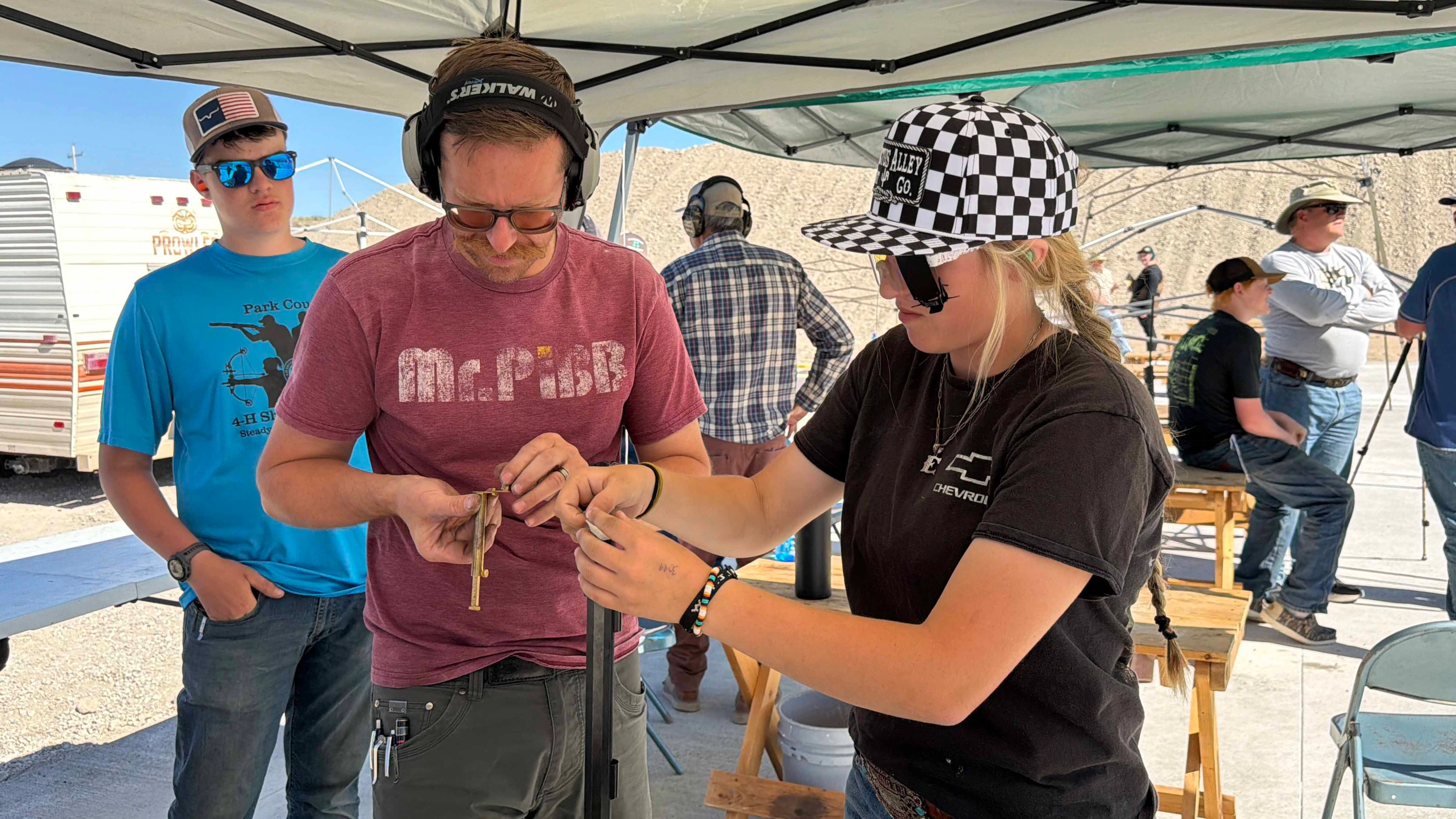 Loading a muzzleloader can take up to 6 minutes. The process is to add powder, patch and steel ball and then add a cap to light the powder. Ellie Feathers said she loves this process and appreciates the sport because of the time it takes to shoot.