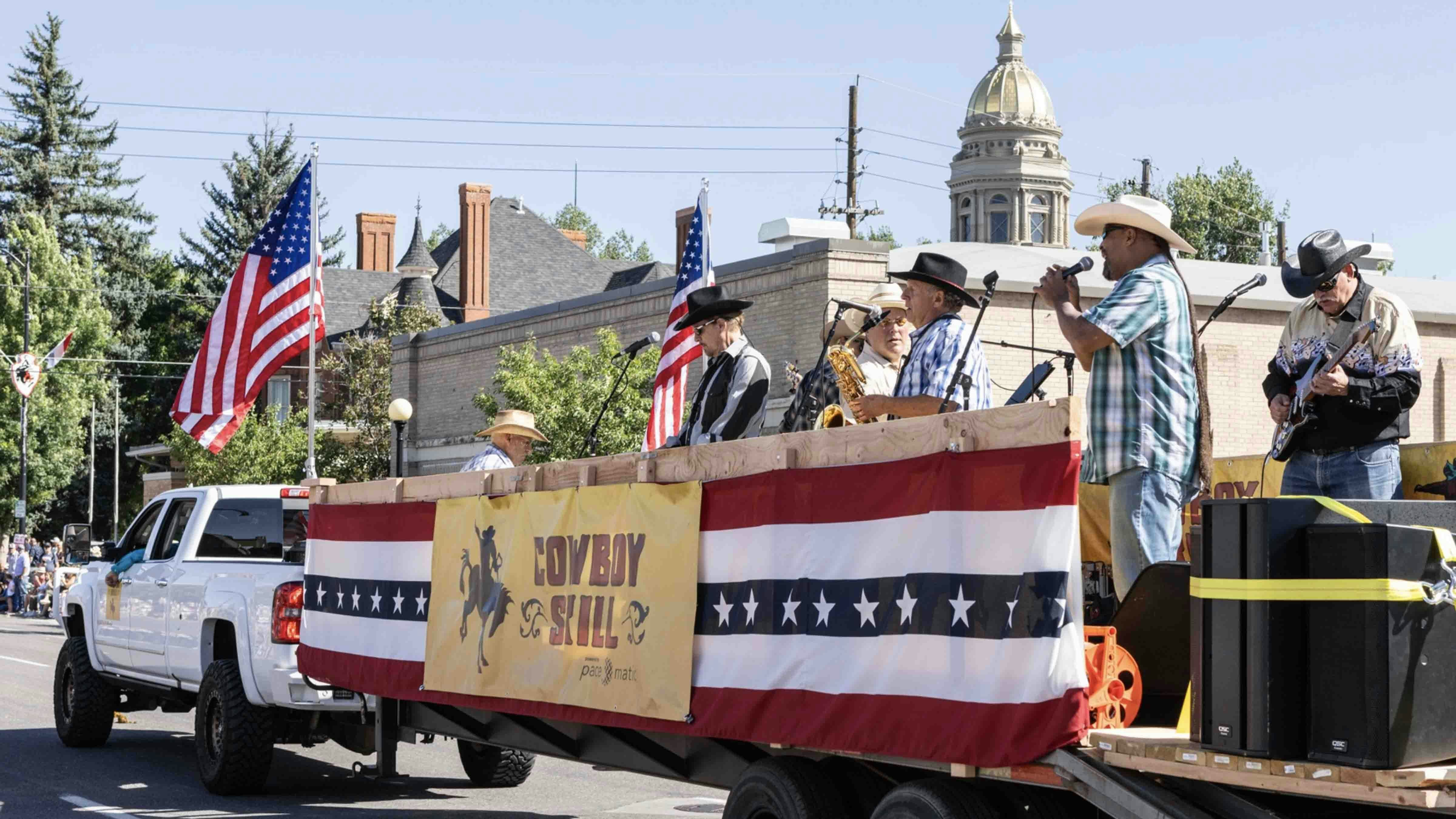 The Nacho Men playing in the Cowboy Skill float in the CFD parade.
