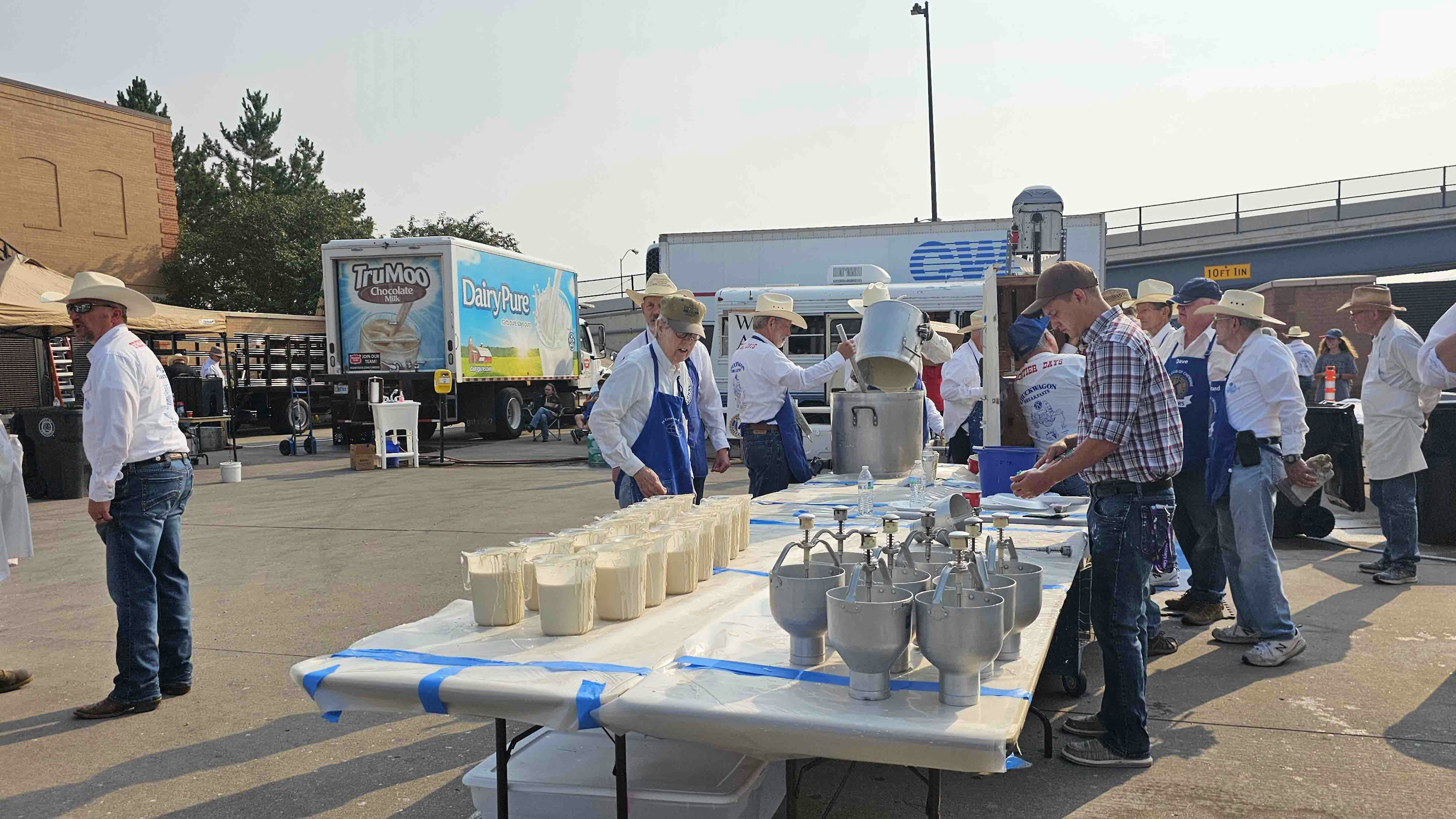 Pitchers of batter await. It takes 5,000 pounds of batter to put on the Pancake feed.