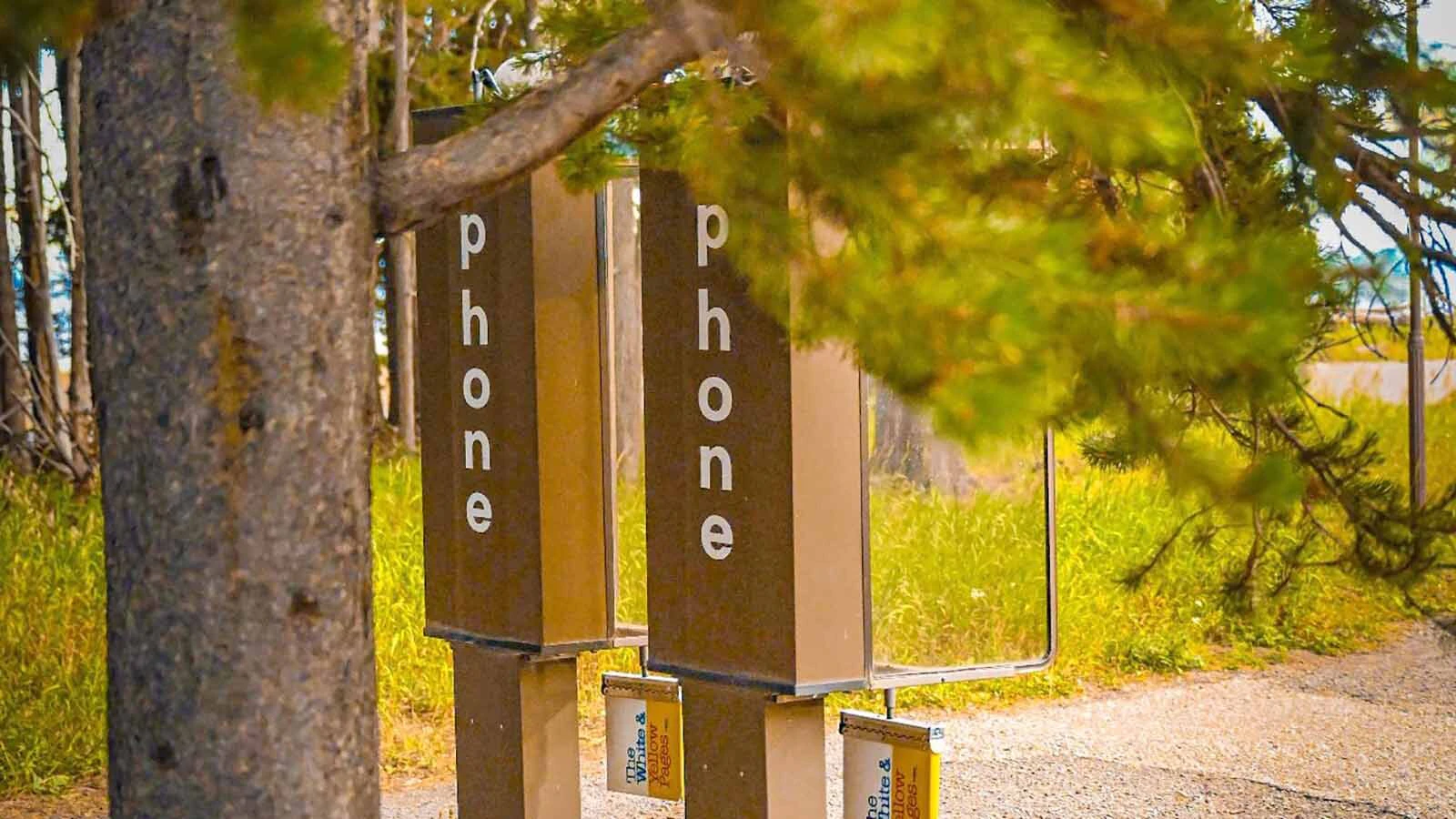 Two phone booths at Lake Village in Yellowstone National Park. While the booths remain, the phones inside have long since disappeared.
