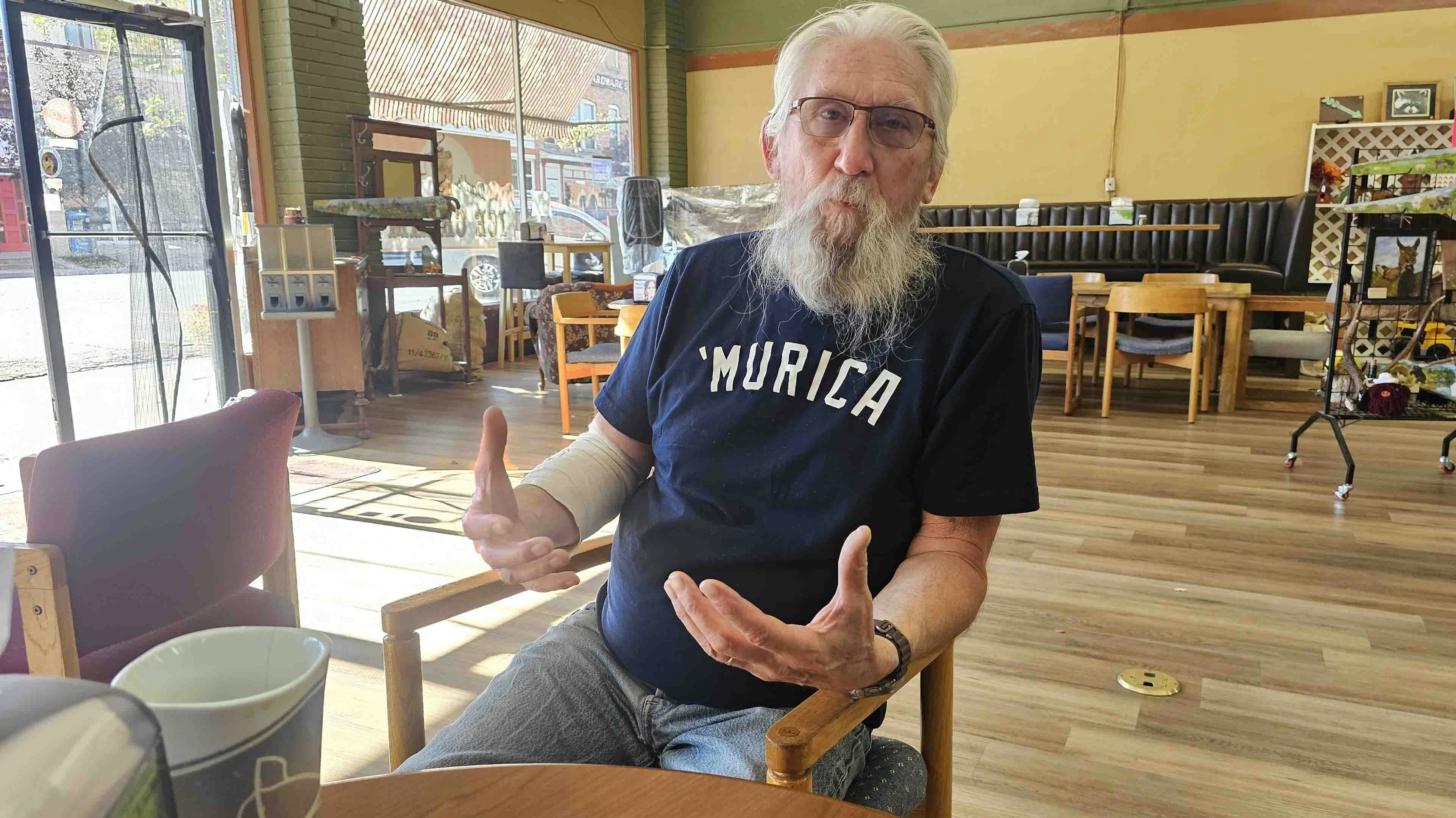 Pete Bass talks about his life with Cowboy State Daily at his coffee shop in Evanston, For Pete's Sake, where he likes to say he serves good coffee and bad puns.