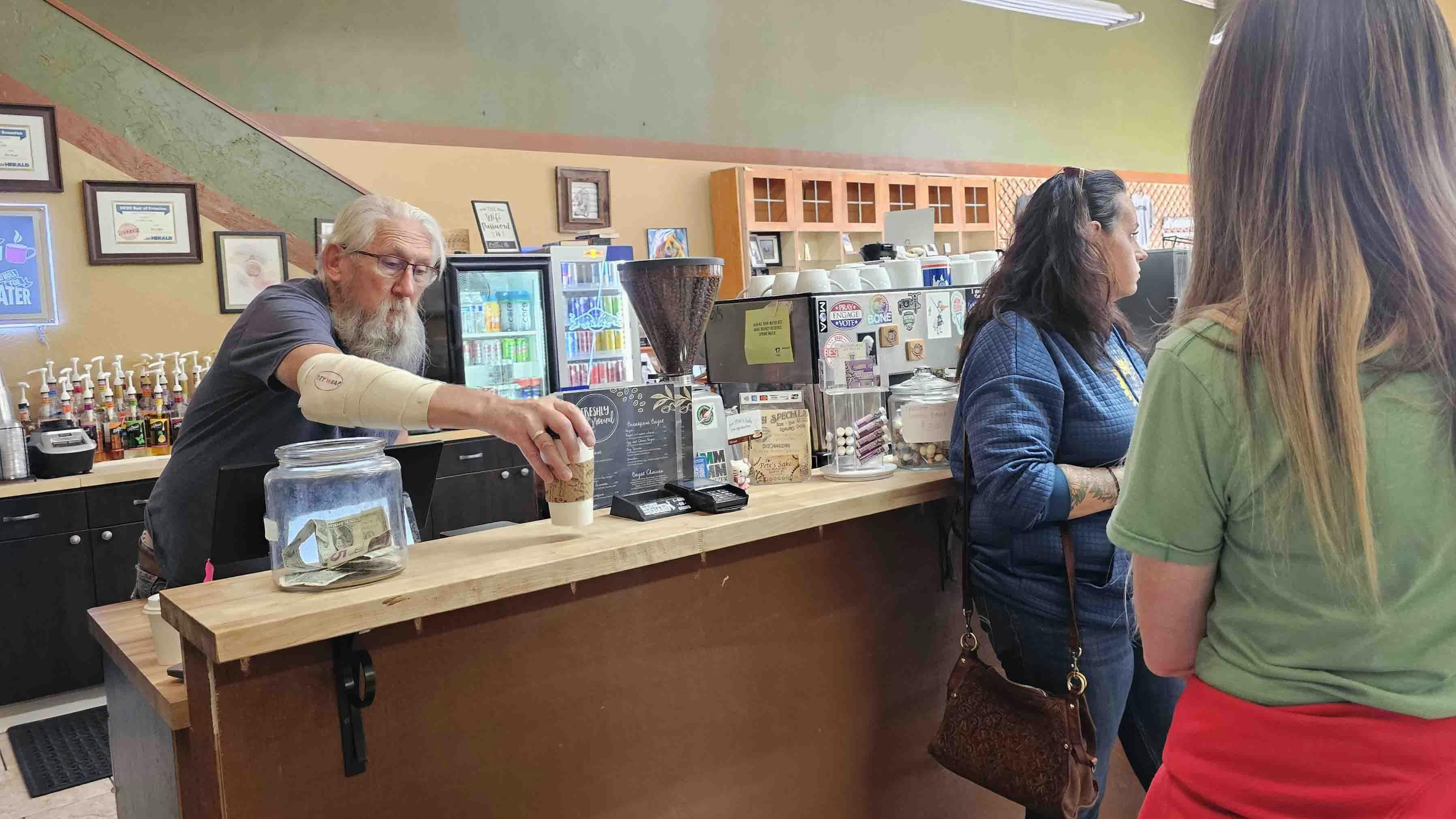 Pete Bass serves coffee and bad puns every day at For Pete's Sake, a coffee shop in Evanston.