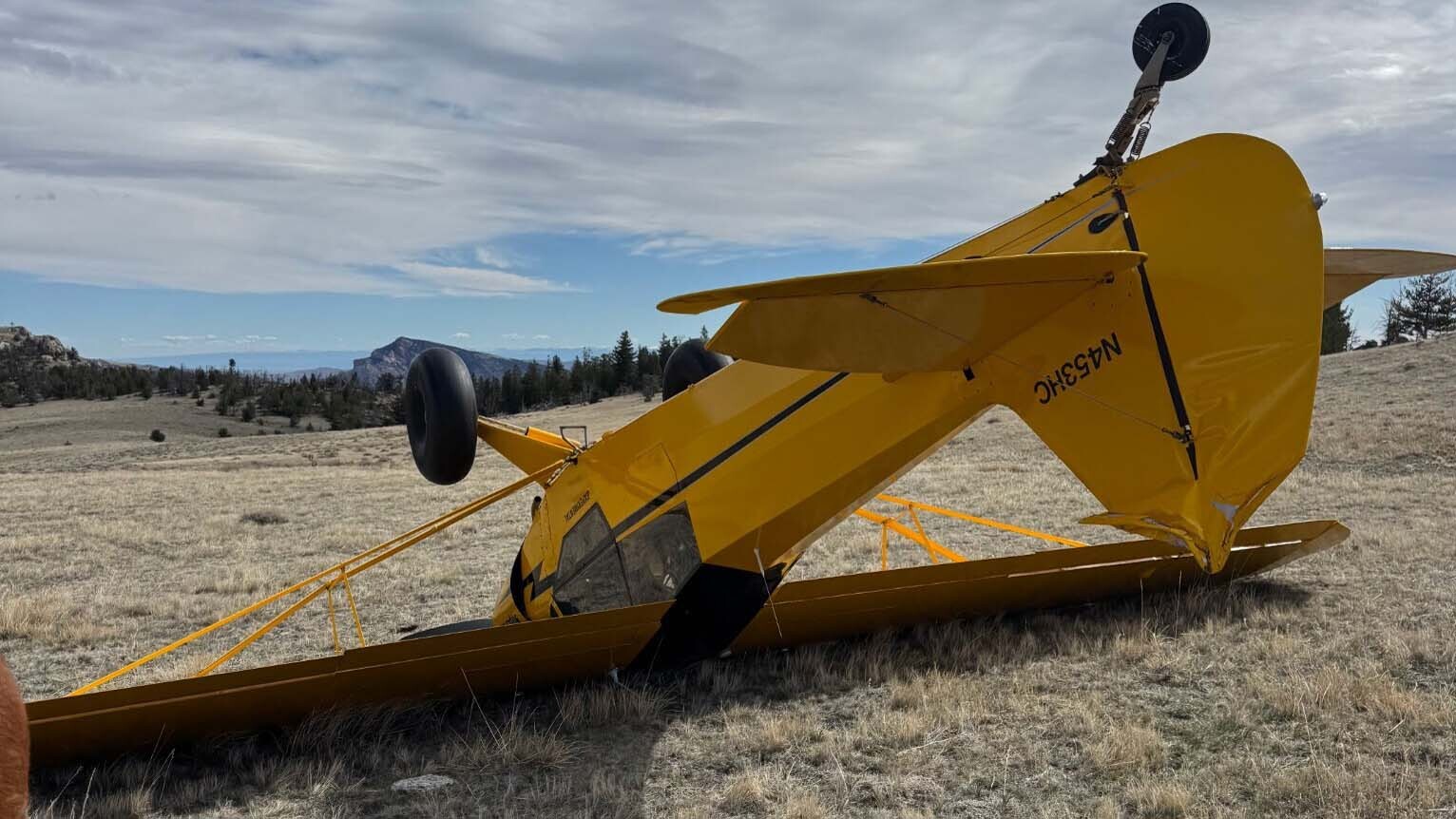 The upside-down aircraft as it landed on Sheep Mountain just outside Cody. The Park County Sheriff's Office got the call of a crashed aircraft on Friday morning and were on their way to the scene when they were informed that the pilot was unharmed and didn't need a rescue.