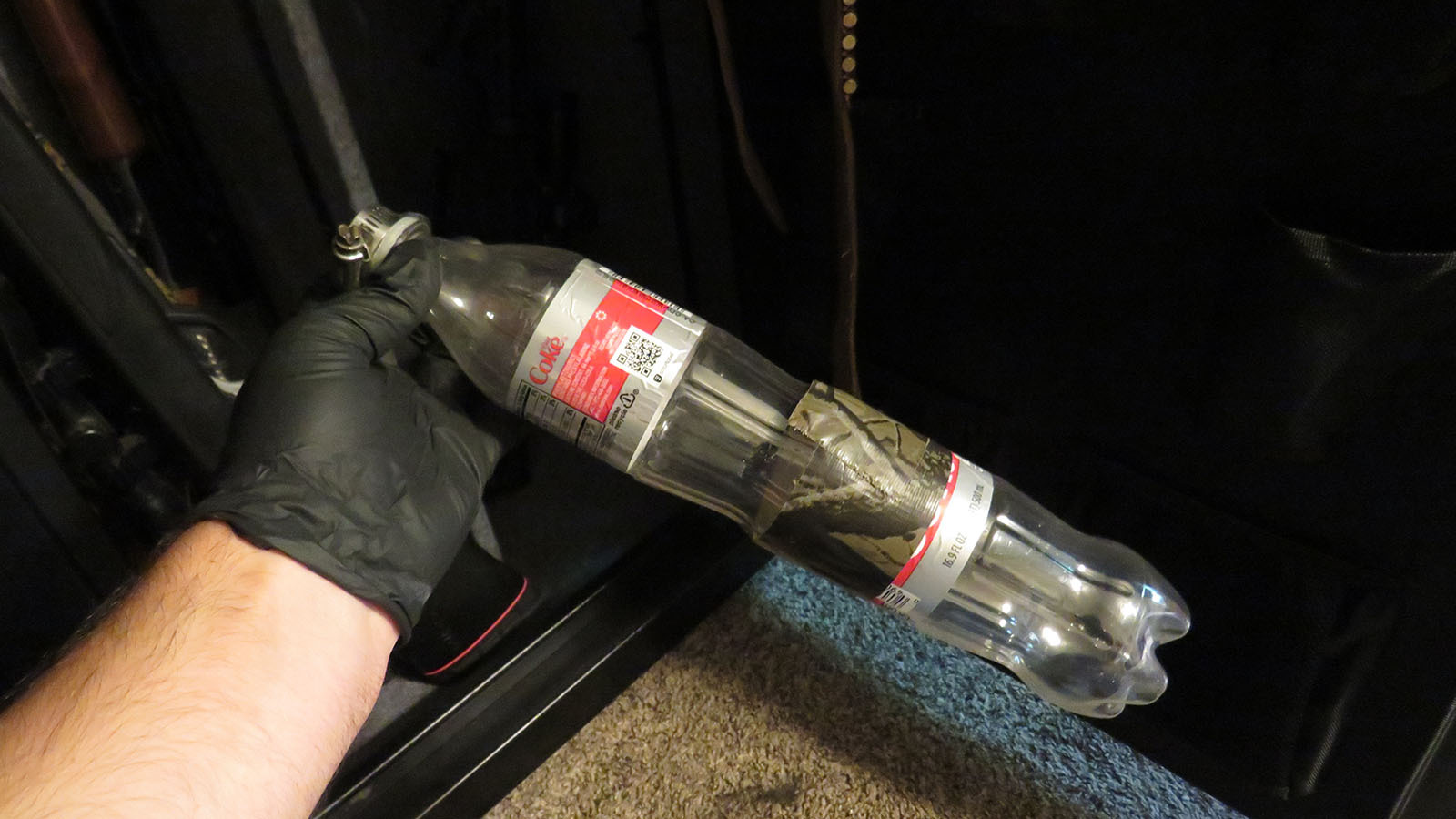 Game wardens say that Timothy Crooks of Green River attached this makeshift suppressor, made from plastic Coke bottles, to a Marlin .22 caliber rifle that he used to illegally shoot multiple deer.