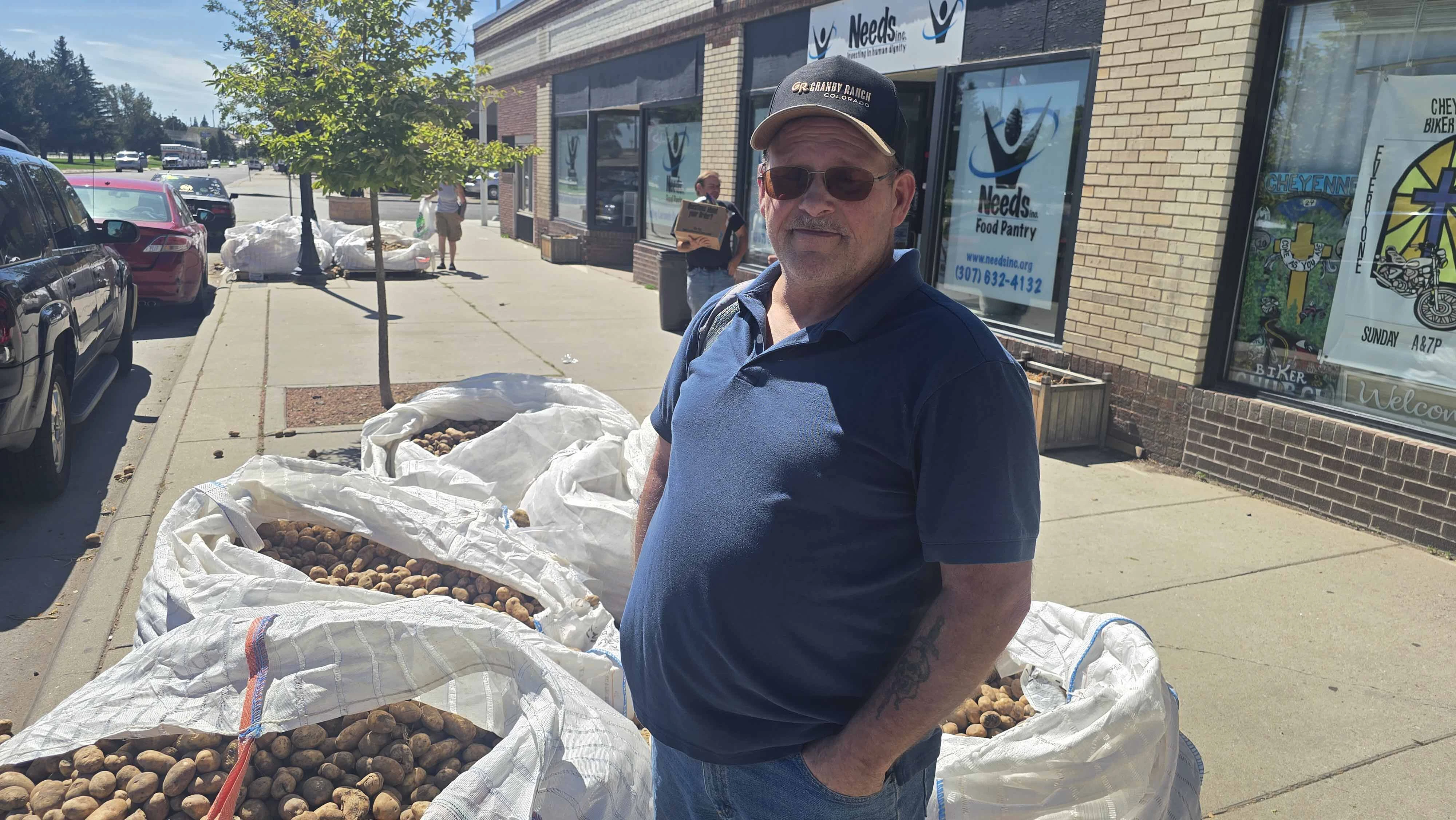 Tim Browning is a retired truck driver. He was among people in Cheyenne helping make sure potatoes didn't go to waste at Needs Inc, which was delivered 42,700 pounds of potatoes from Idaho on Saturday.