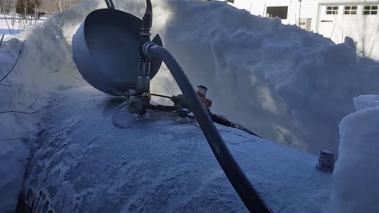 Propane tank snow