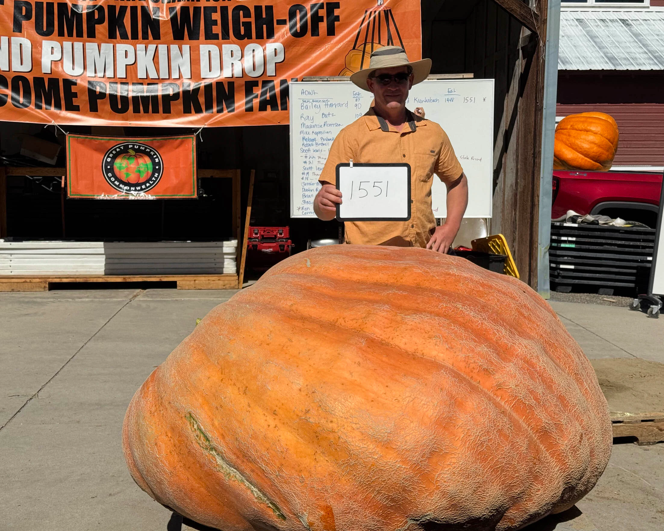 Chad Kurtenbach of Lovell with his 1,551-pound pumpkin at the 2026 Wyoming State Champion Weigh-Off and Pumpkin Drop. This was Kurtenbach's second consecutive win.