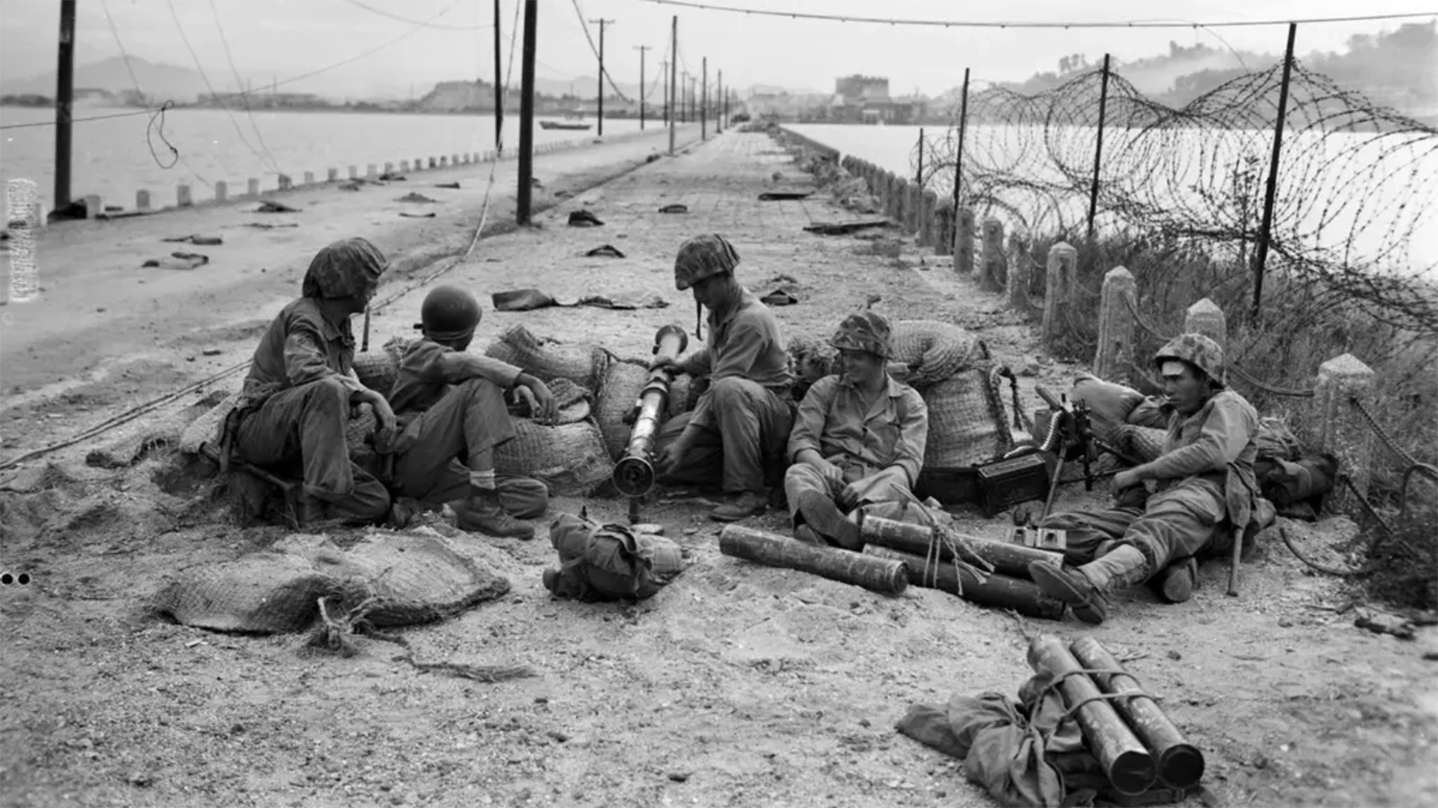 U.S. Marines block a road and establish and outpost during the Korean War.