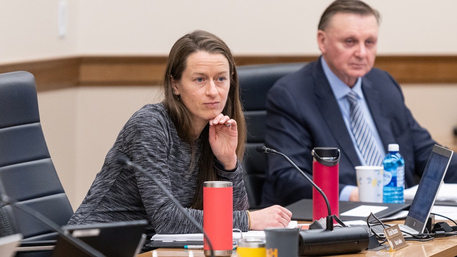 State Auditor Kristi Racines (center) at State Lands and Investment Board Meeting on April 6, 2023.