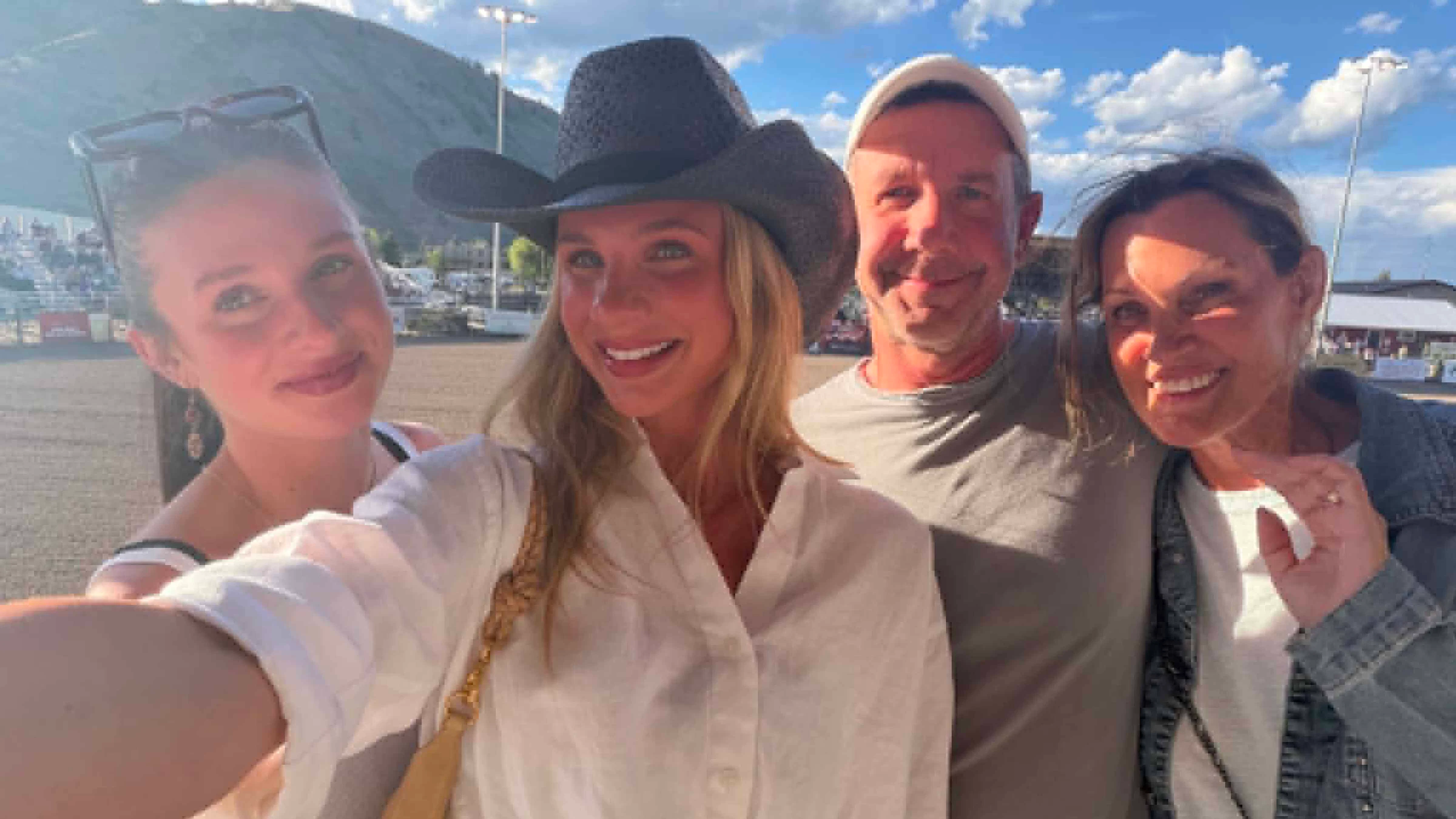 Tory Raether poses with his daughters, Grace, left, and Melanie, center, and his wife, Jean, during a recent family trip to Wyoming